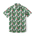 White shirt with green leaves and pink flamingo pattern.