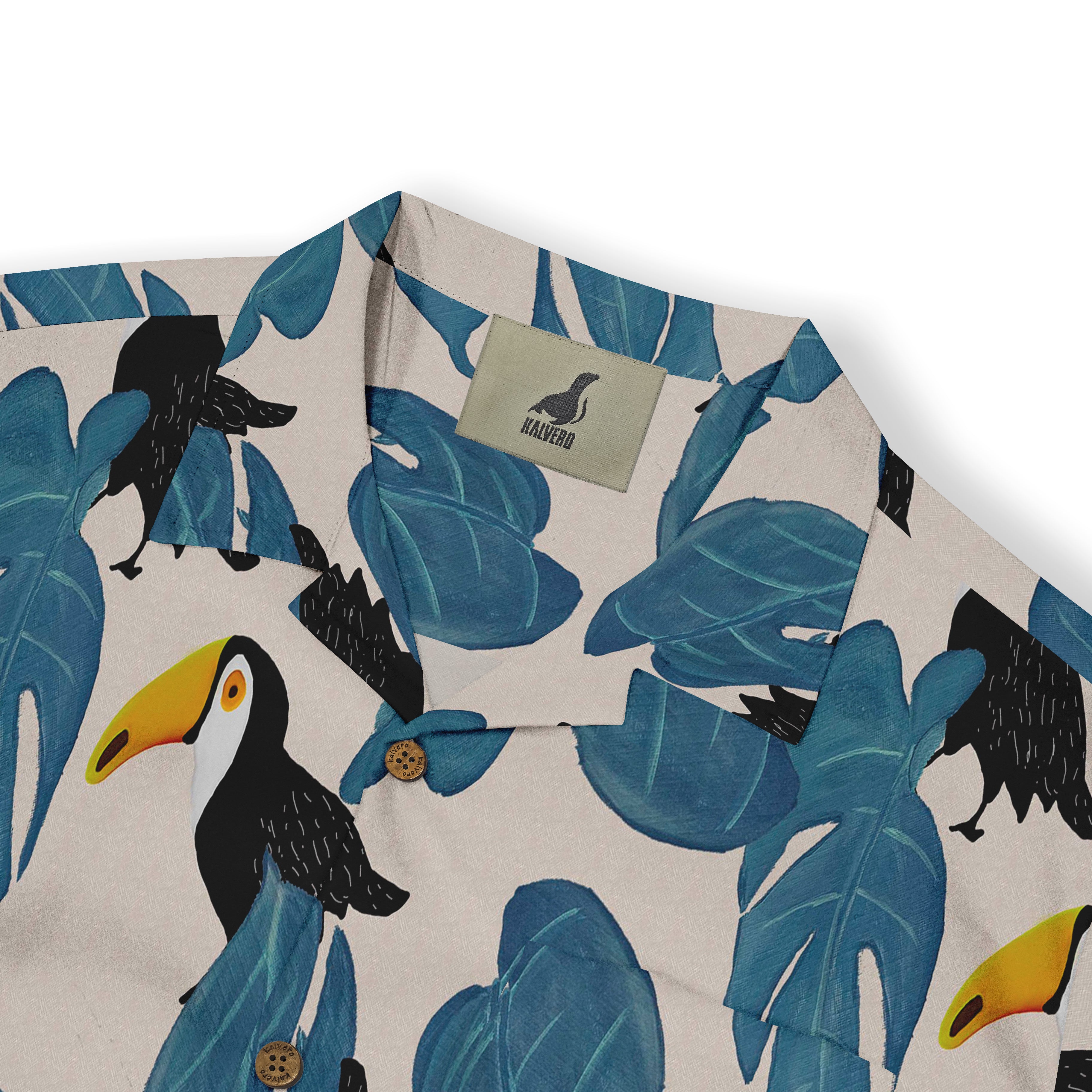 Tropical shirt with toucan and leaf print, featuring a brand tag.