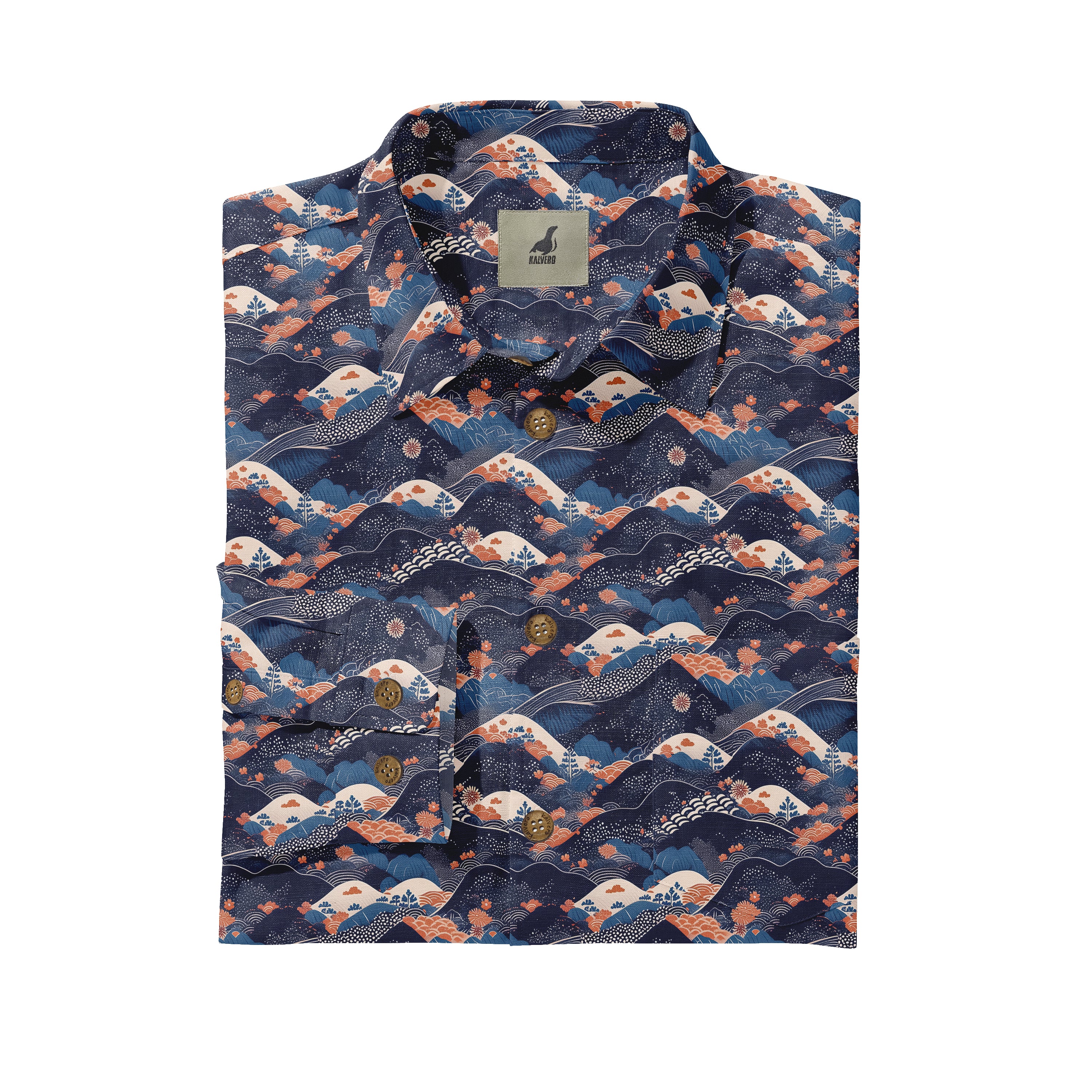 Blue shirt with wave and mountain print, folded neatly.