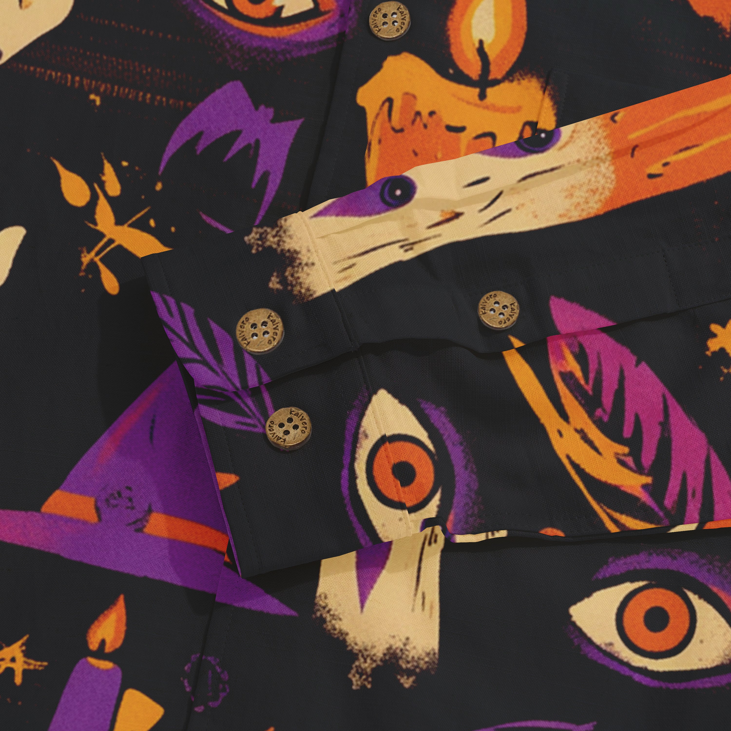 Halloween-themed shirt with witch hats, candles, and eyes on a dark.