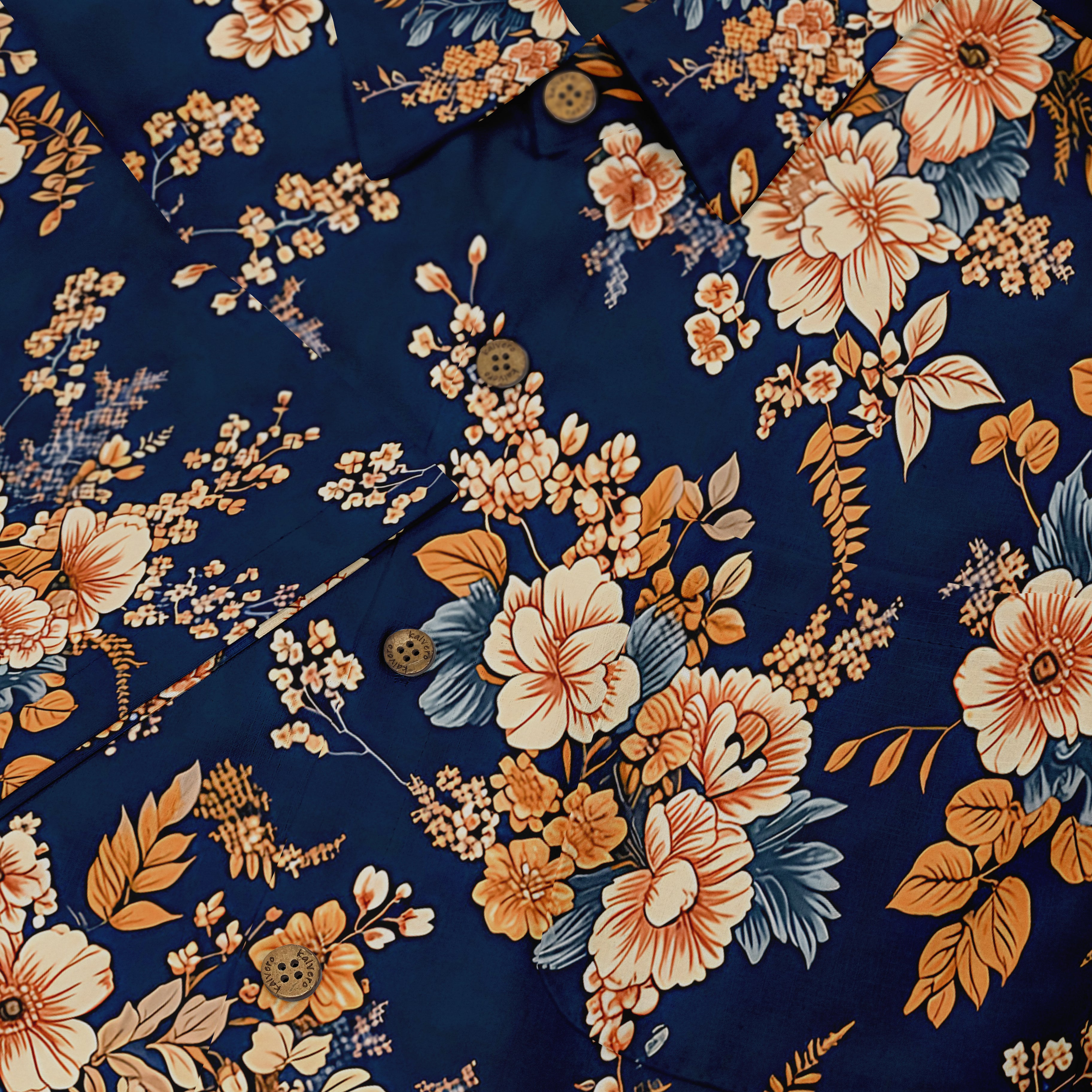 Navy blue shirt with vibrant floral pattern in orange, cream.