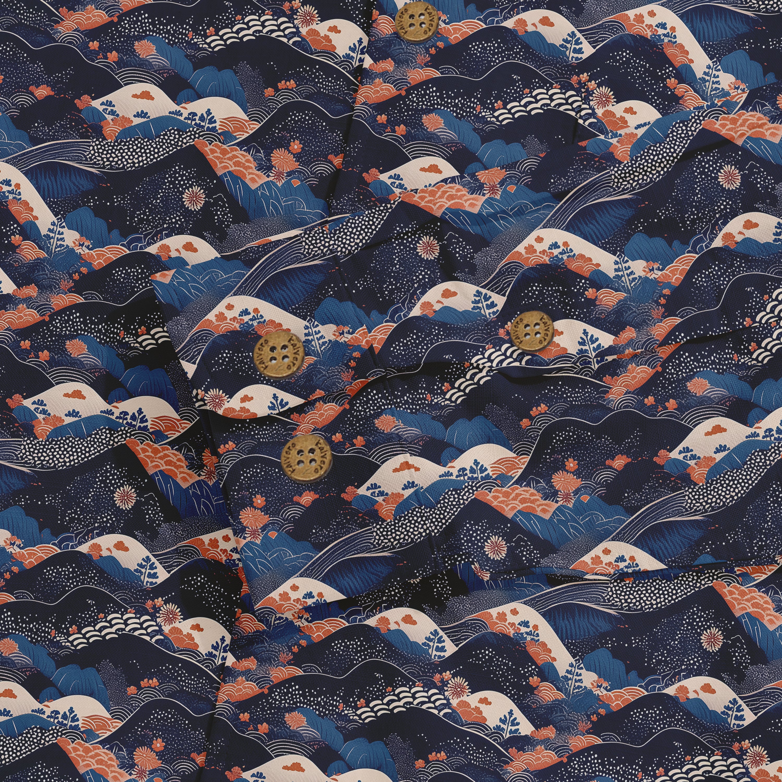Dark blue fabric with orange and white floral patterns.