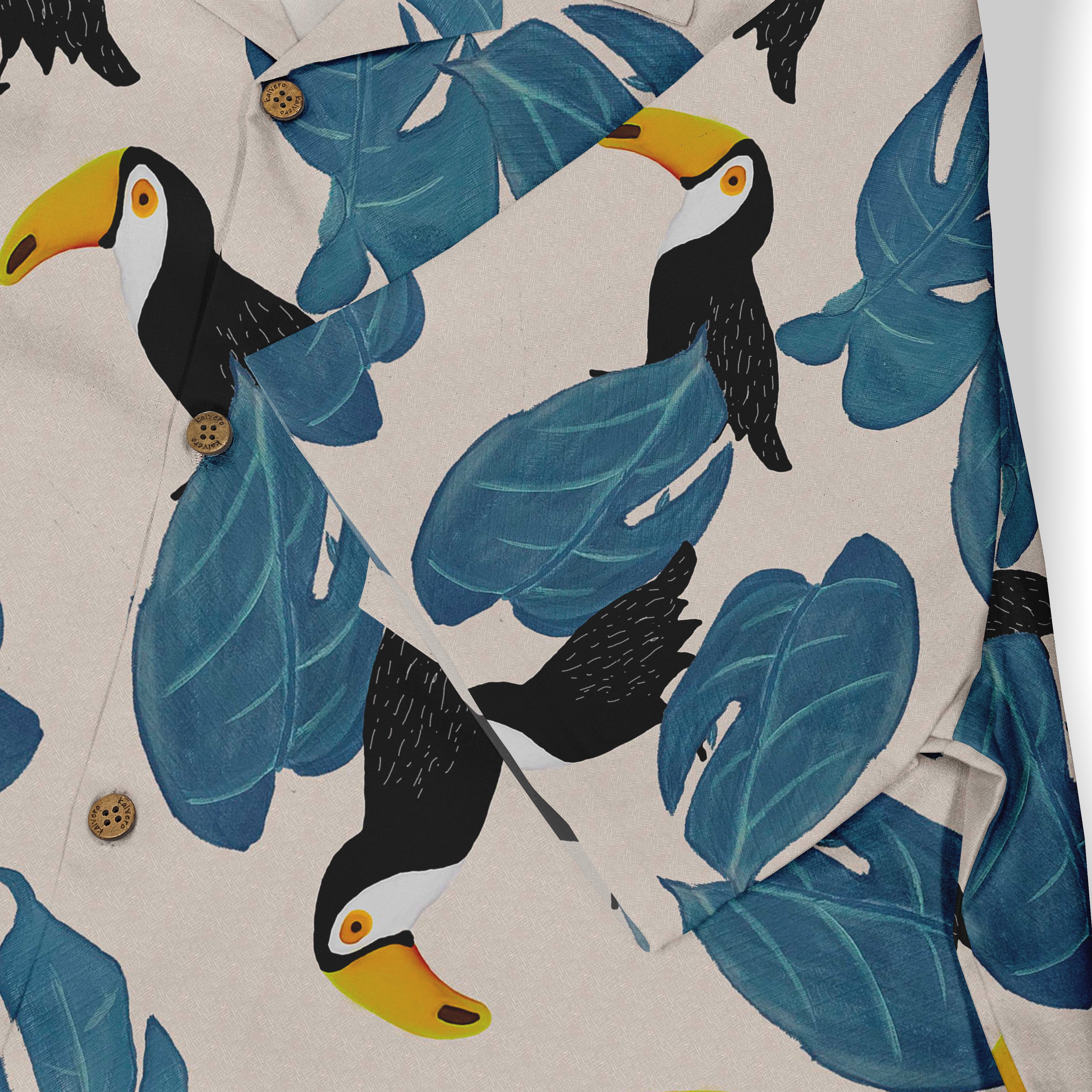 Tropical shirt with toucan and leaf print, featuring wooden buttons.