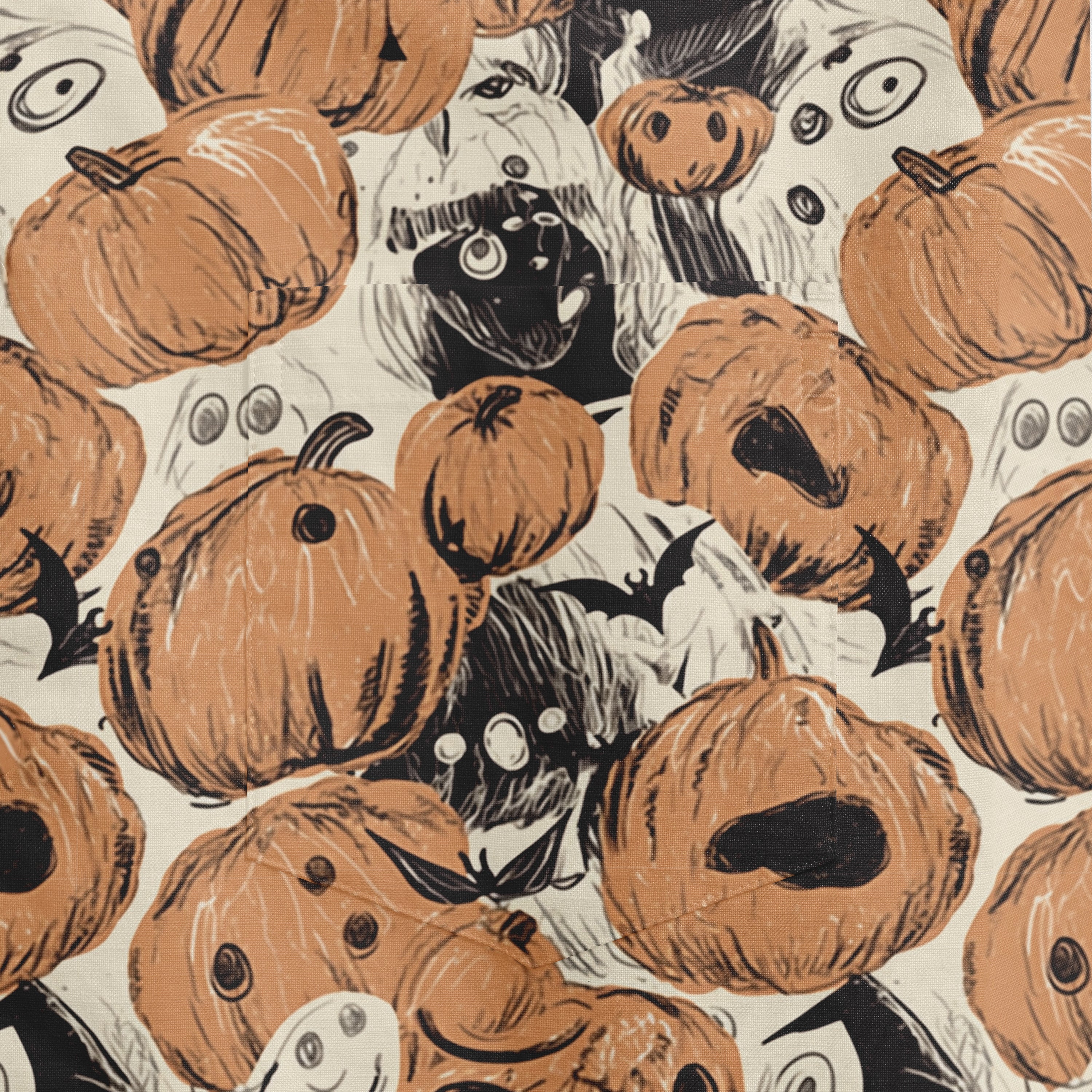 Halloween-themed fabric with orange pumpkins, ghosts, bats.