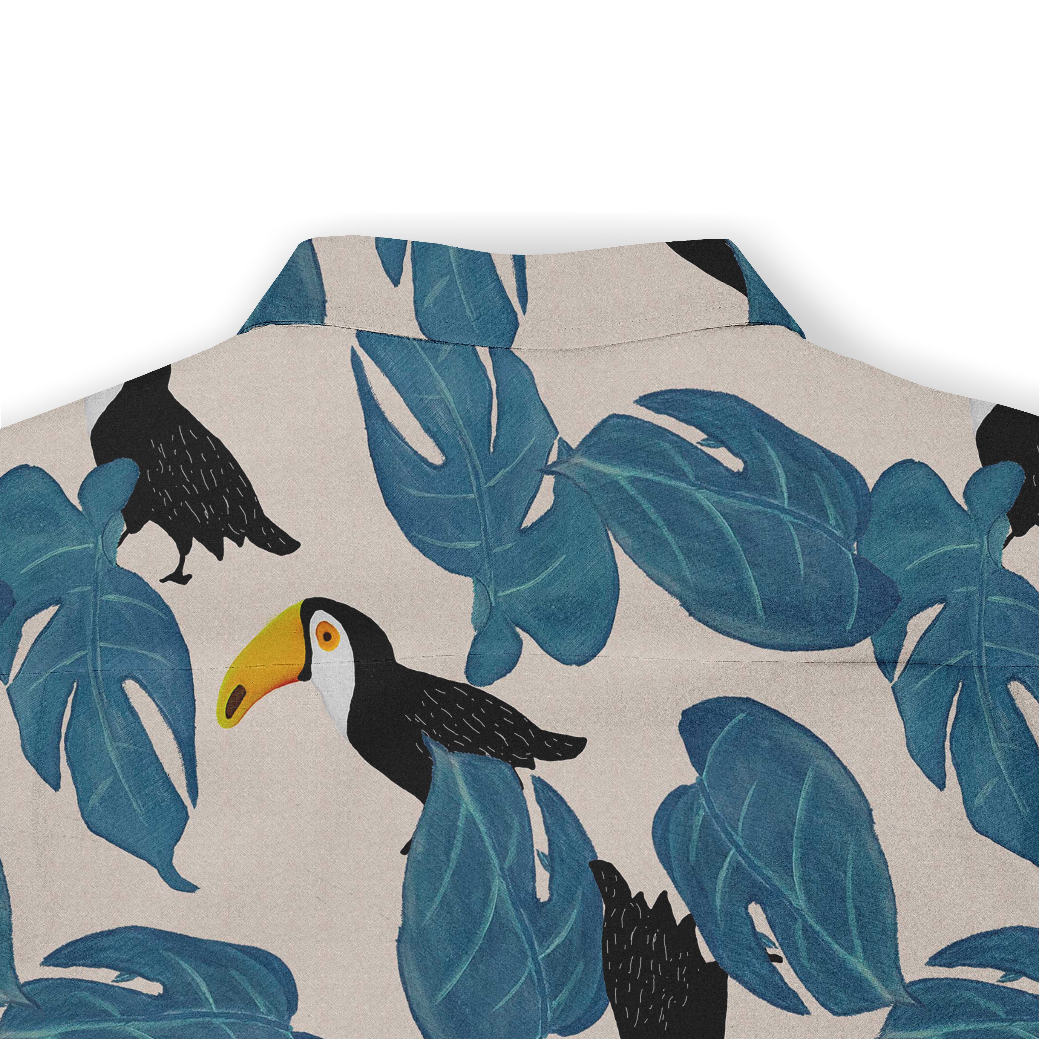 Tropical shirt with toucan and leaf pattern on beige background.