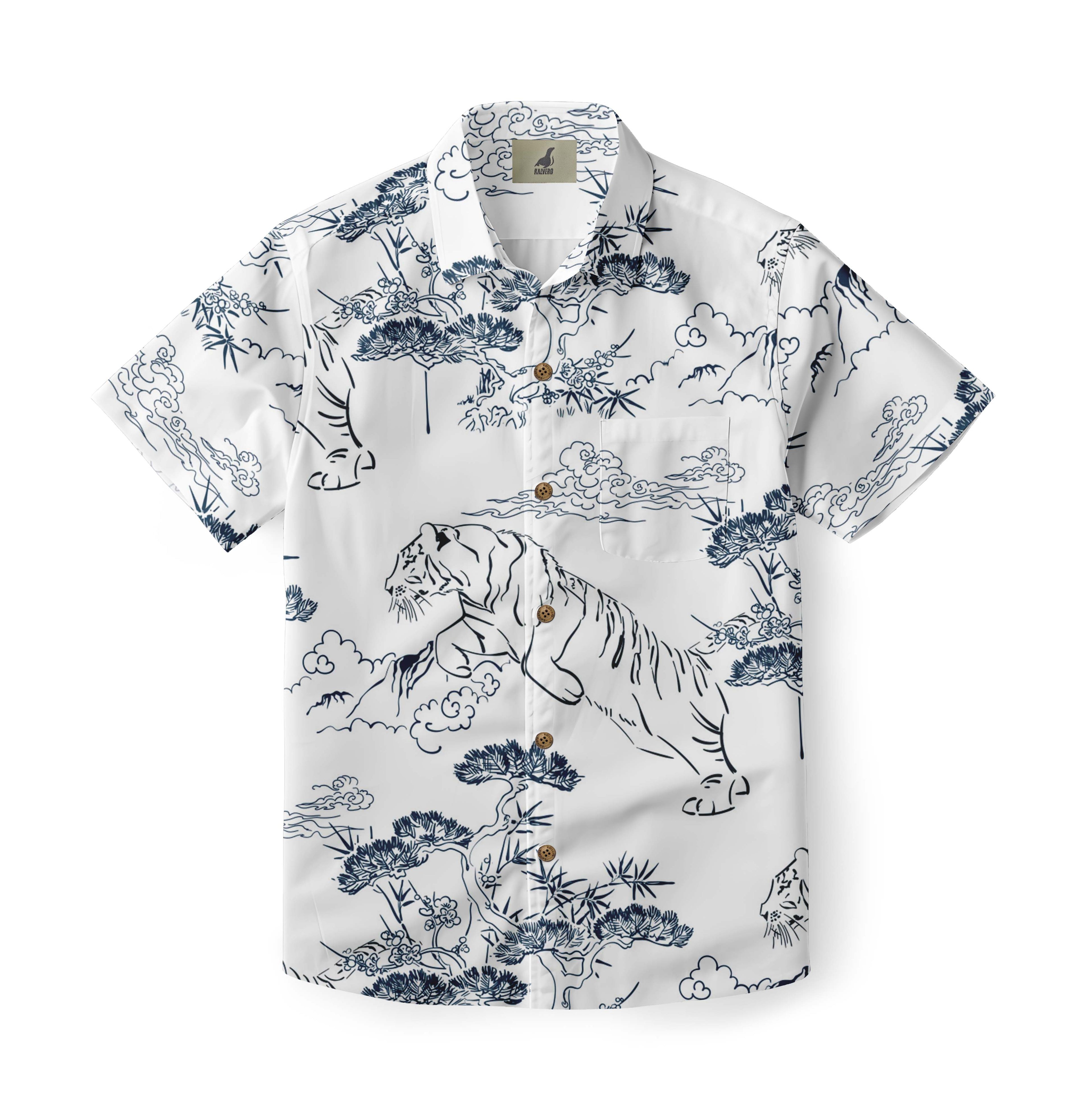 White shirt with blue tiger, bamboo, and cloud patterns.