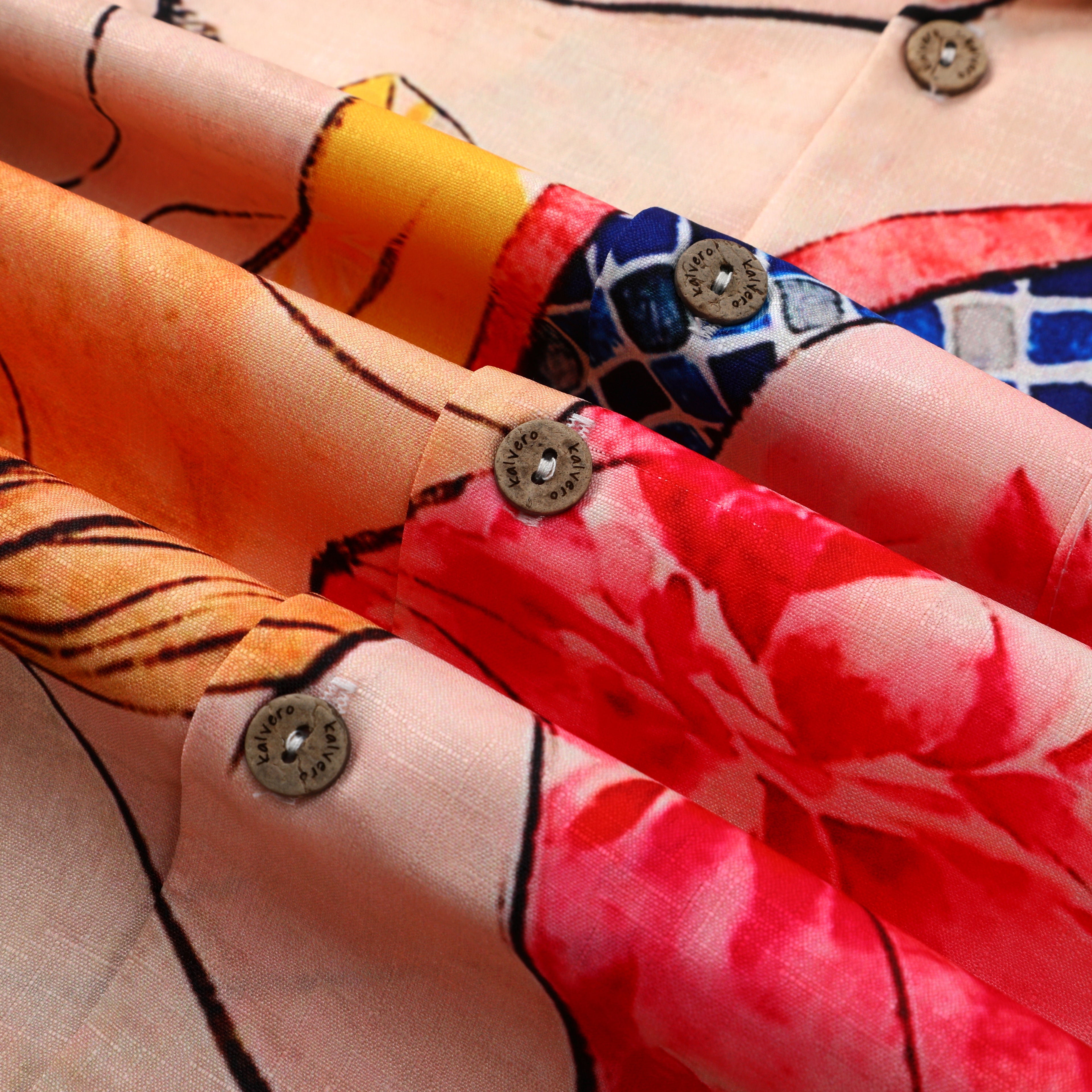 Colorful floral shirt sleeves with buttons.