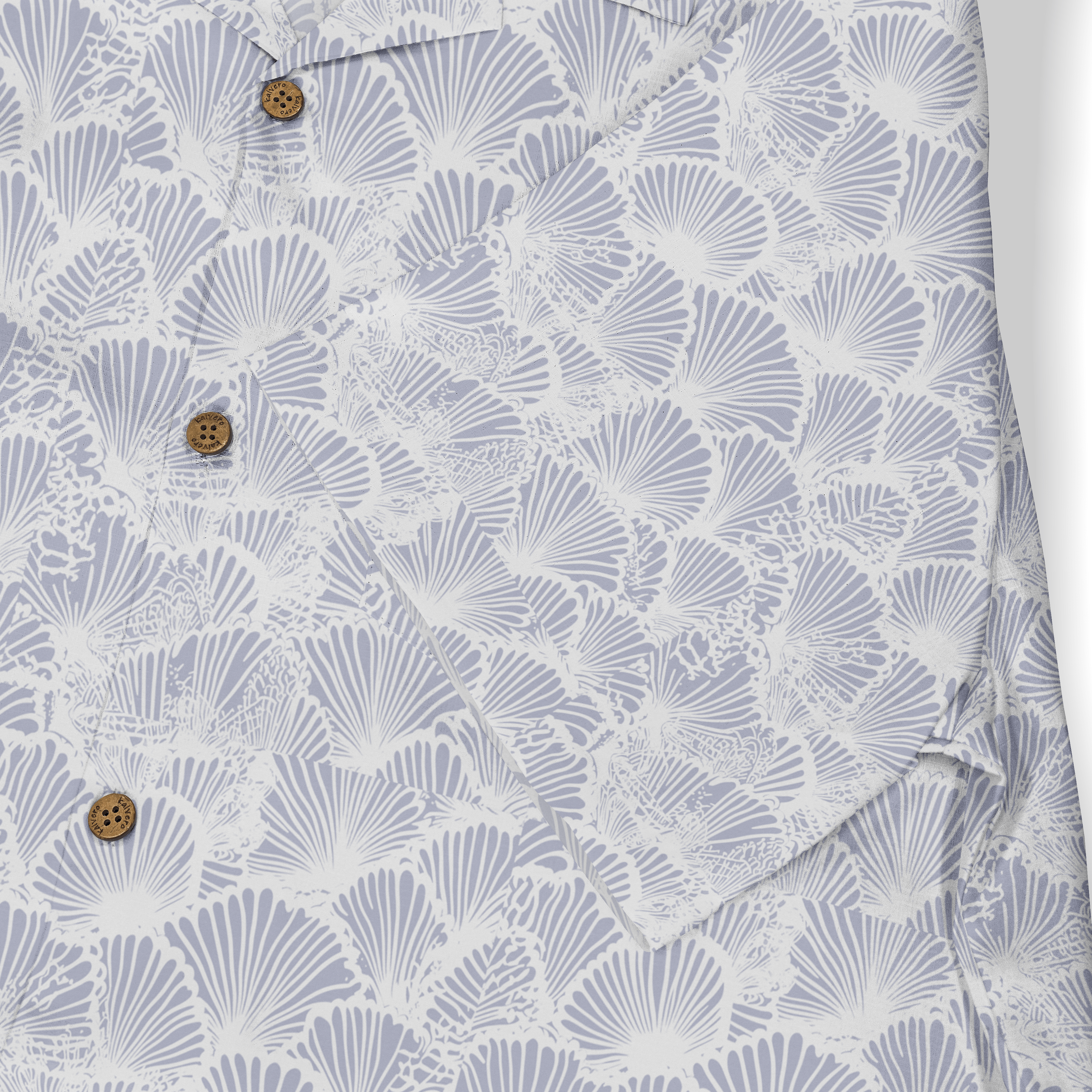 Light blue shirt with white fan patterns and brown buttons.