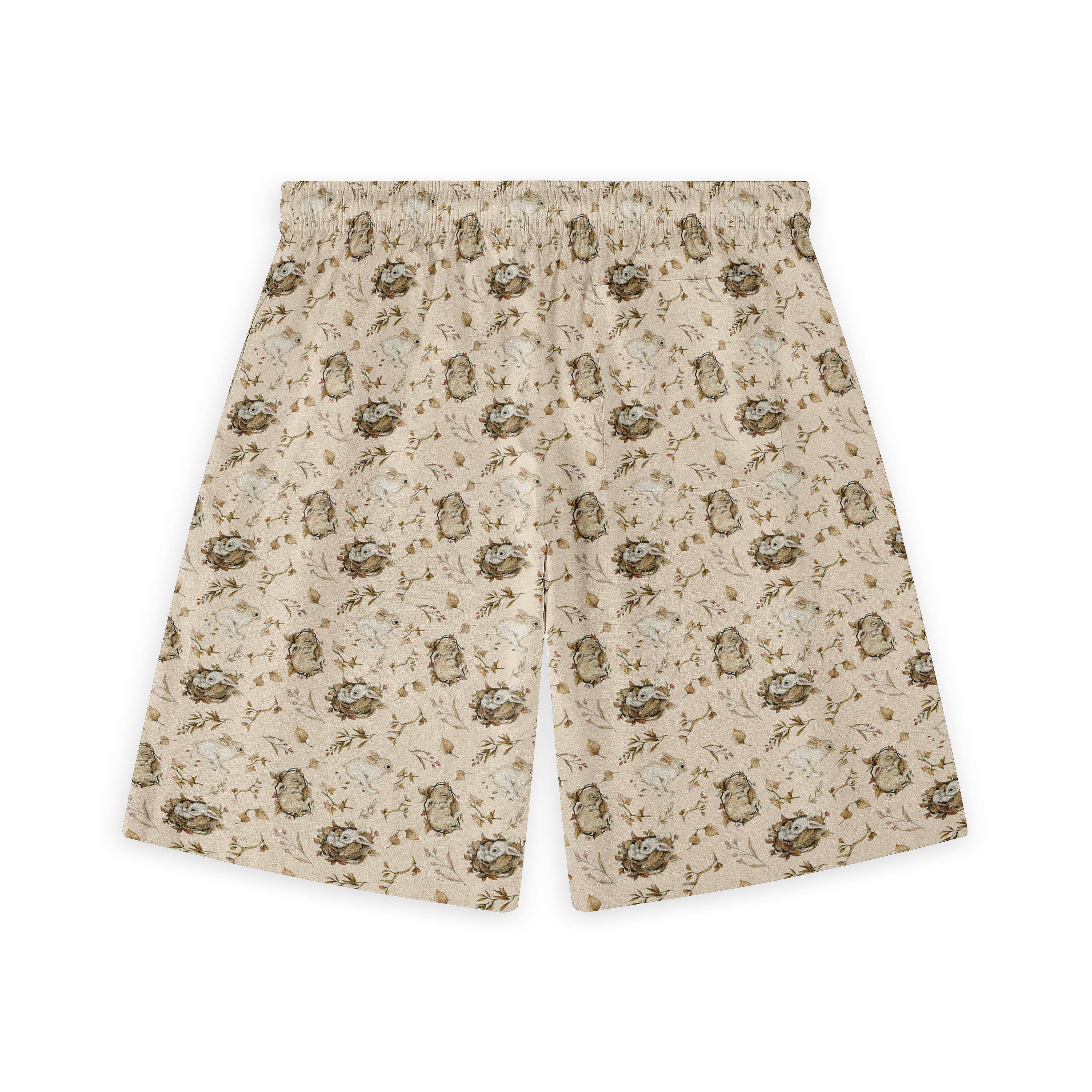 Beige shorts with a cute rabbit and floral pattern, featuring an.