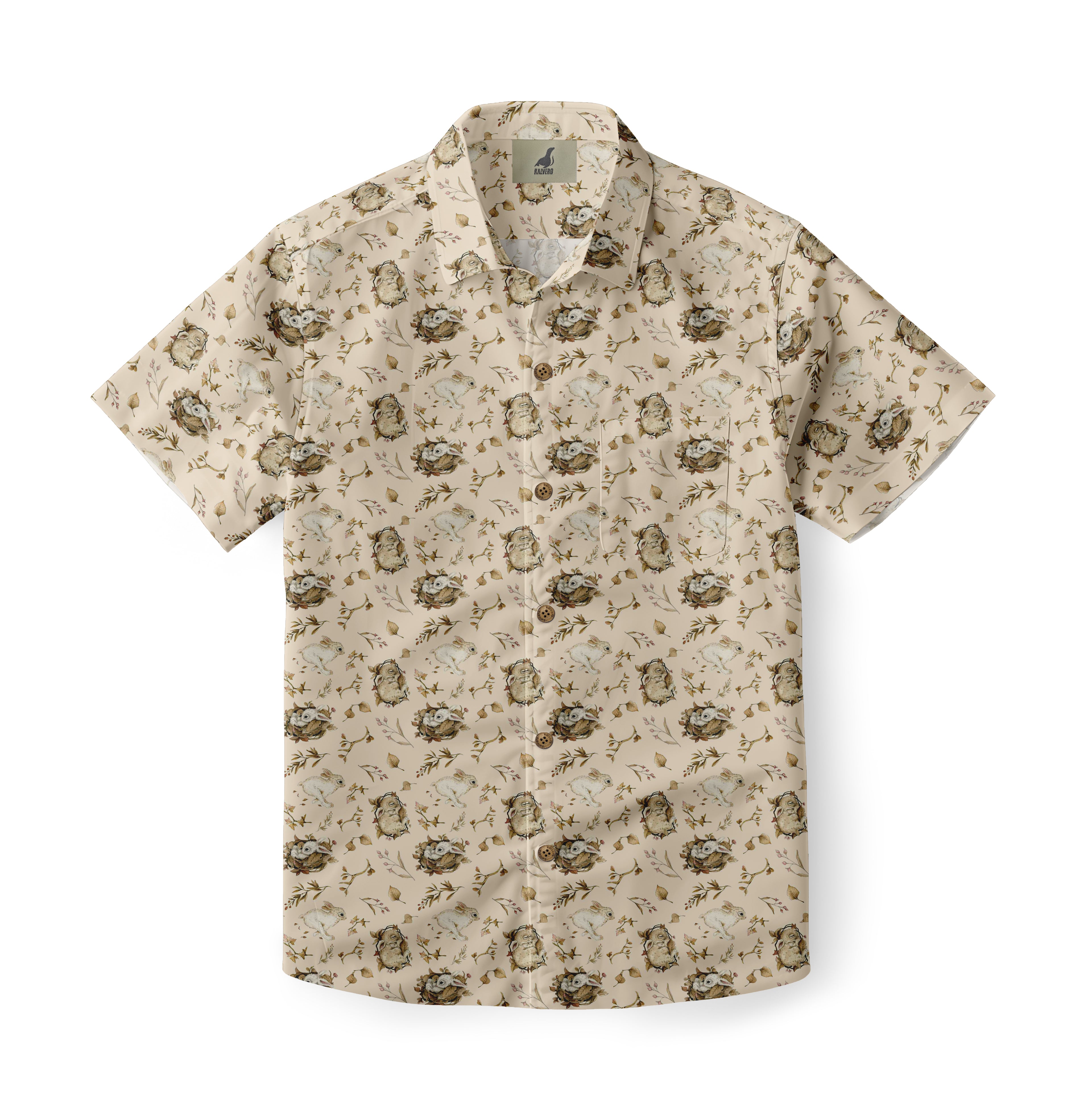 Beige short-sleeve shirt with a charming rabbit and floral pattern.