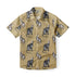 Beige short-sleeve shirt with black cat illustrations in various.