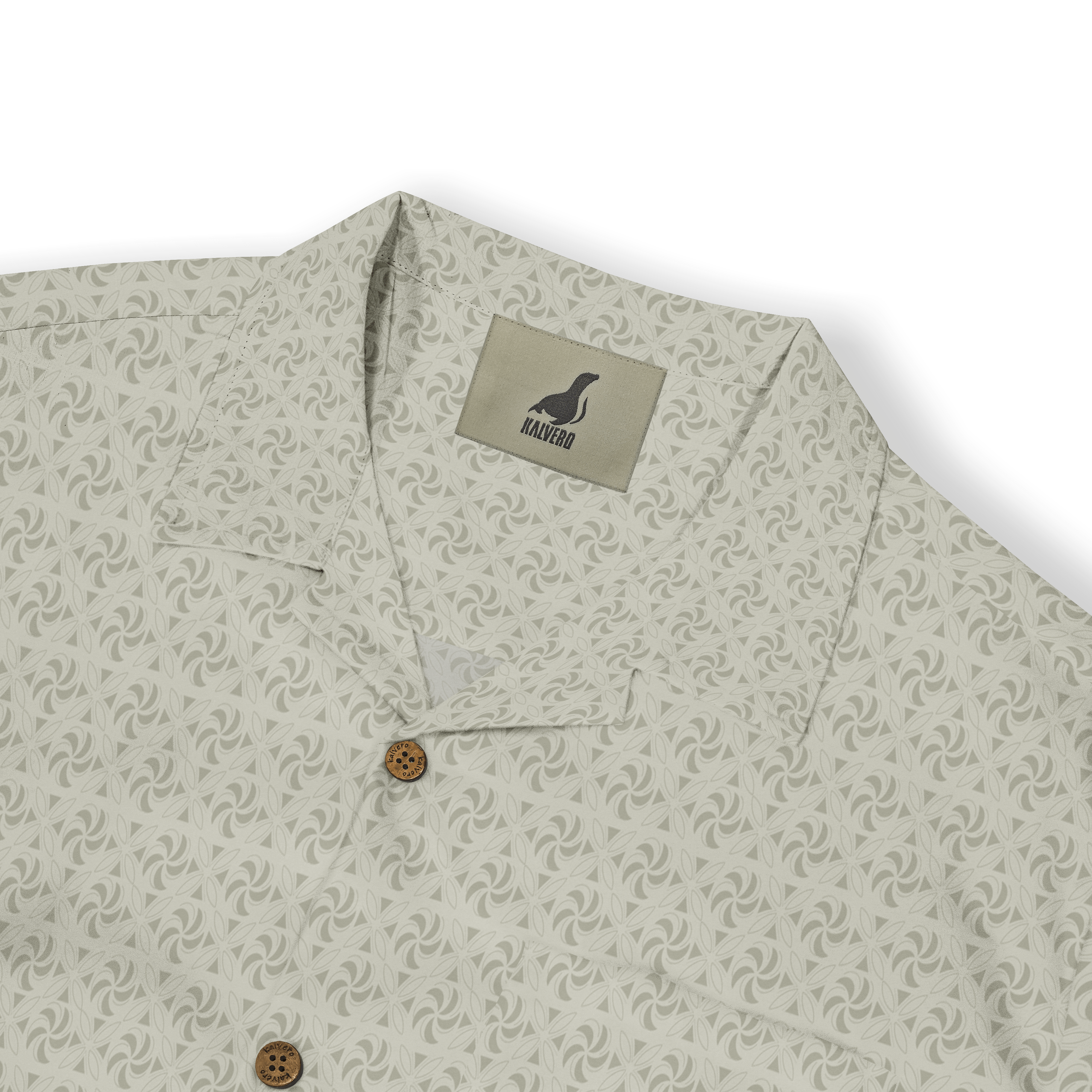 Light beige shirt with floral pattern, wooden buttons, and Malvero.