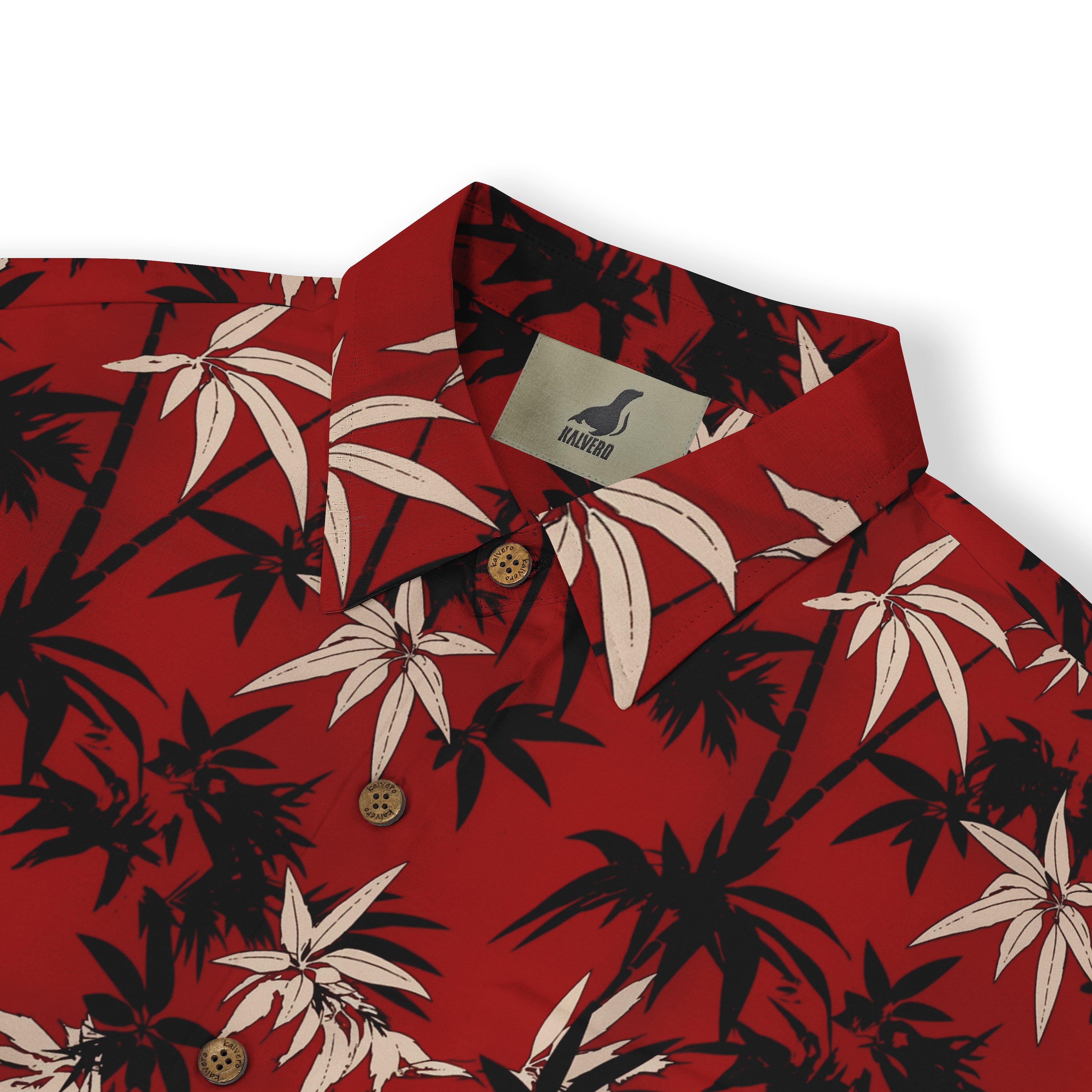 Red shirt with black and white palm leaf pattern, featuring buttons.