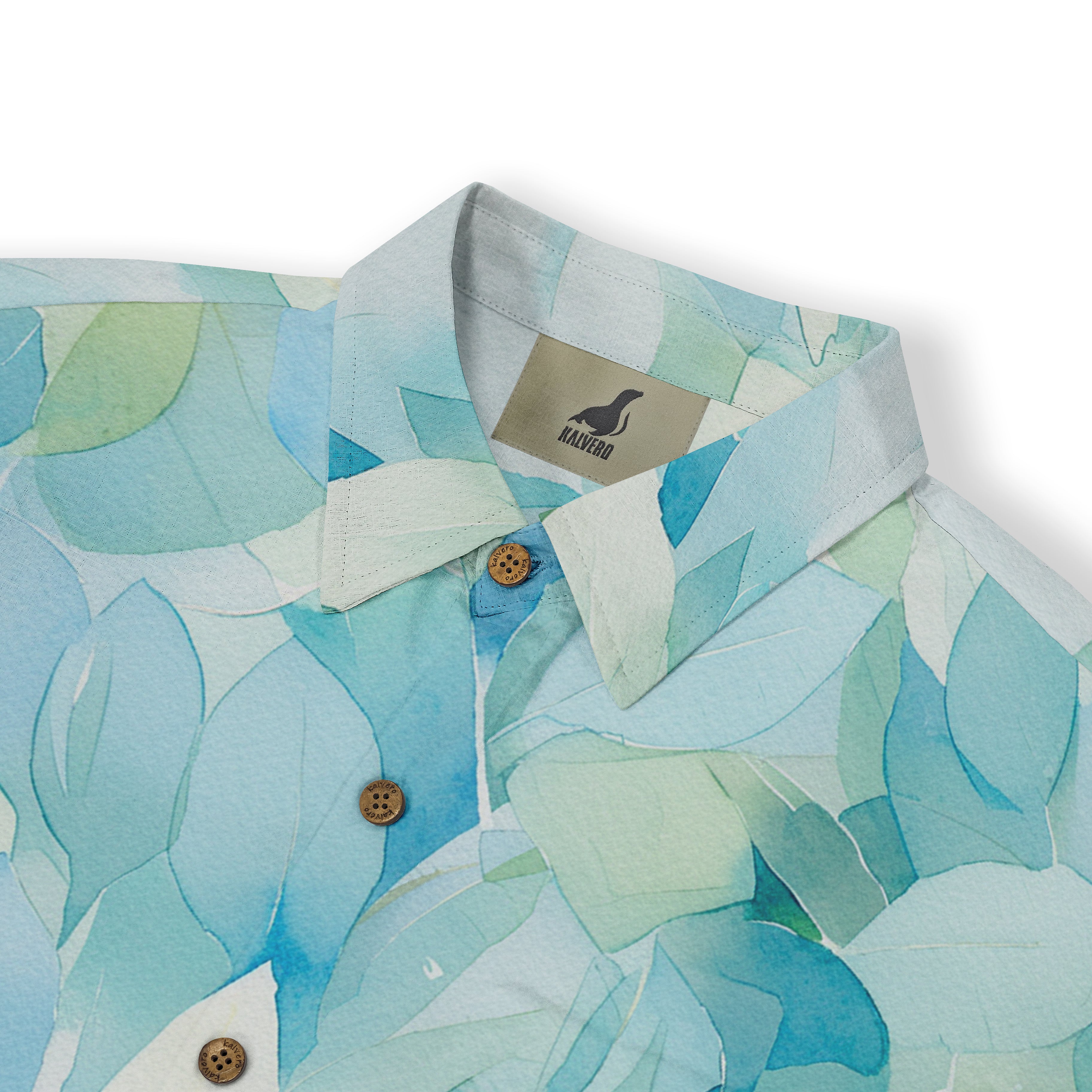 A vibrant, leaf-patterned shirt in shades of blue and green.