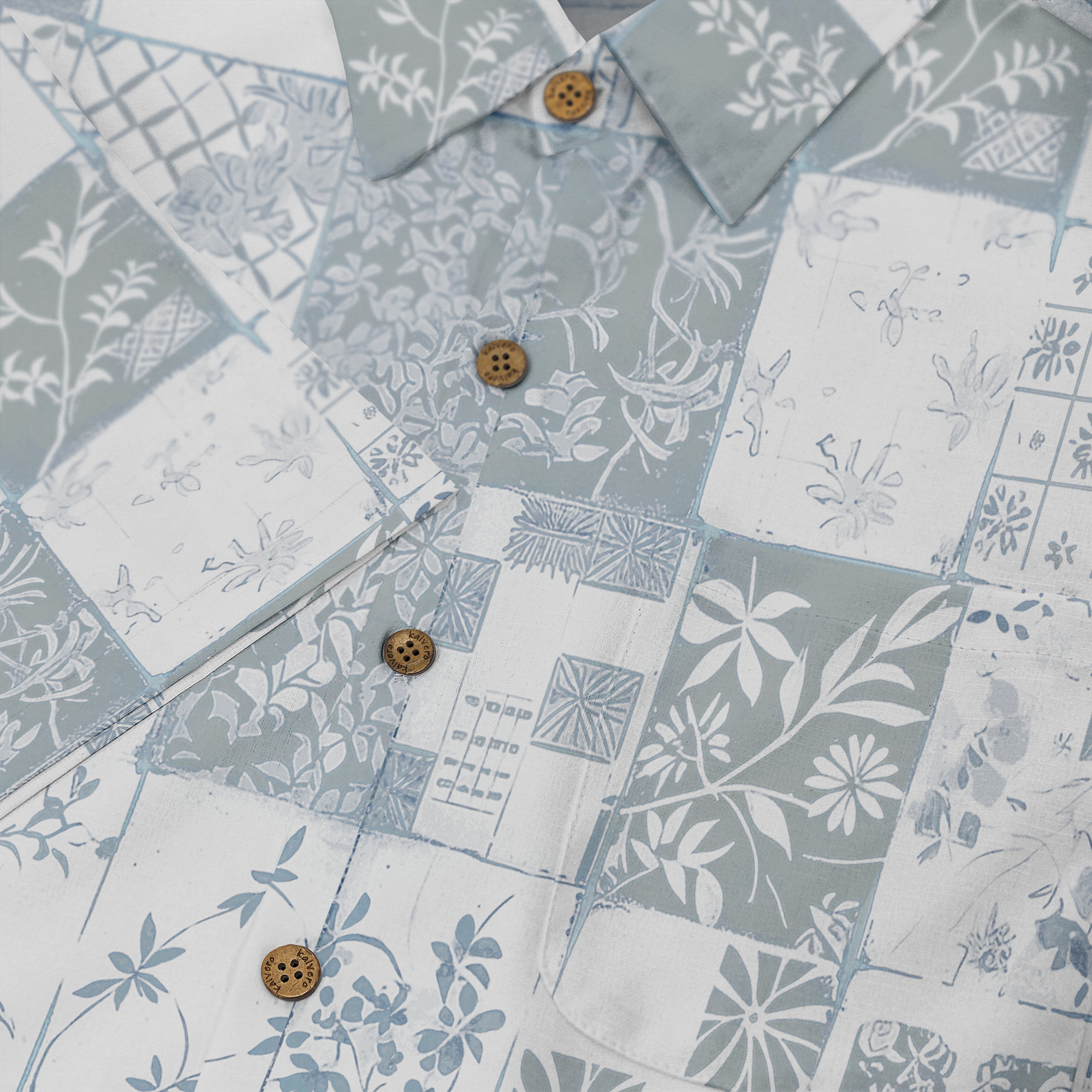 Light blue and white patterned shirt with floral and geometric.