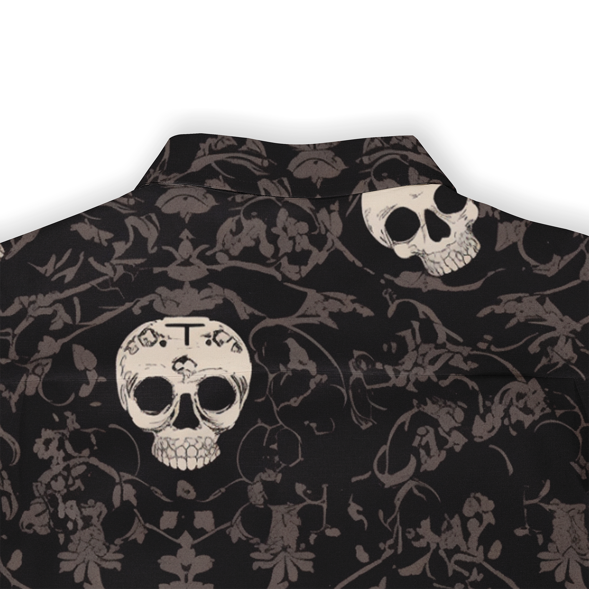 Black shirt with skull and floral pattern, featuring a prominent.