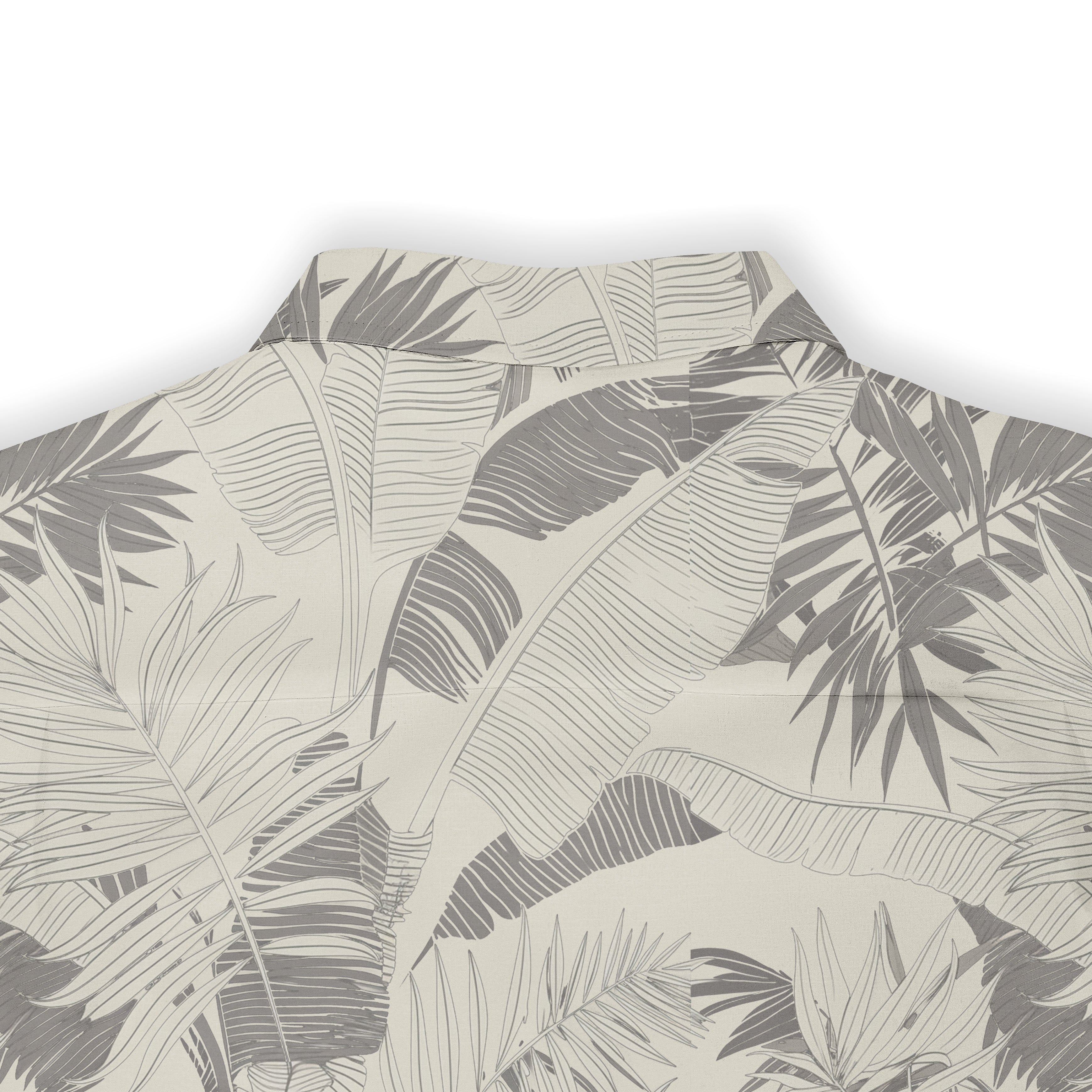 Beige shirt with gray tropical leaf pattern.