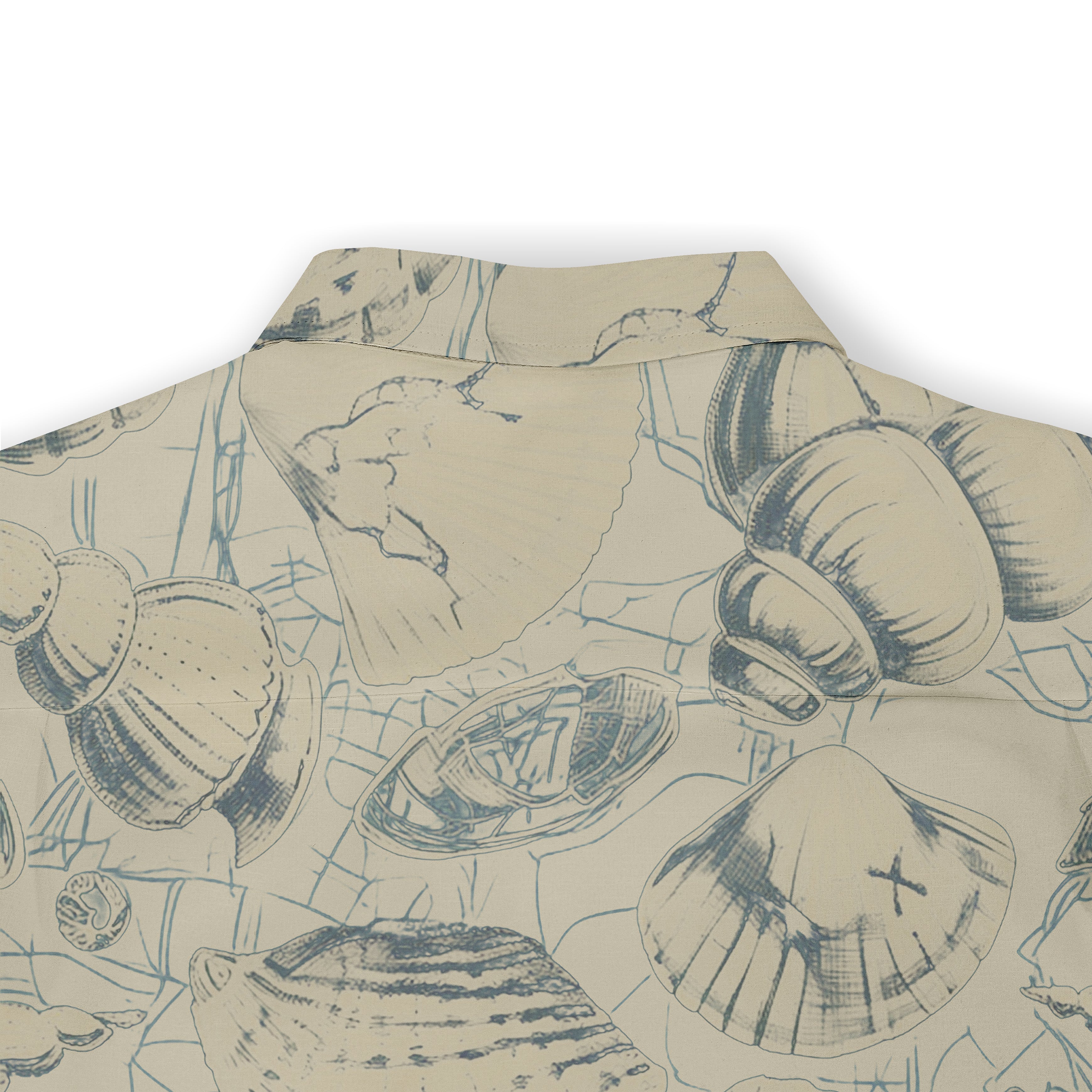 Beige shirt with blue seashell and marine life print, featuring.