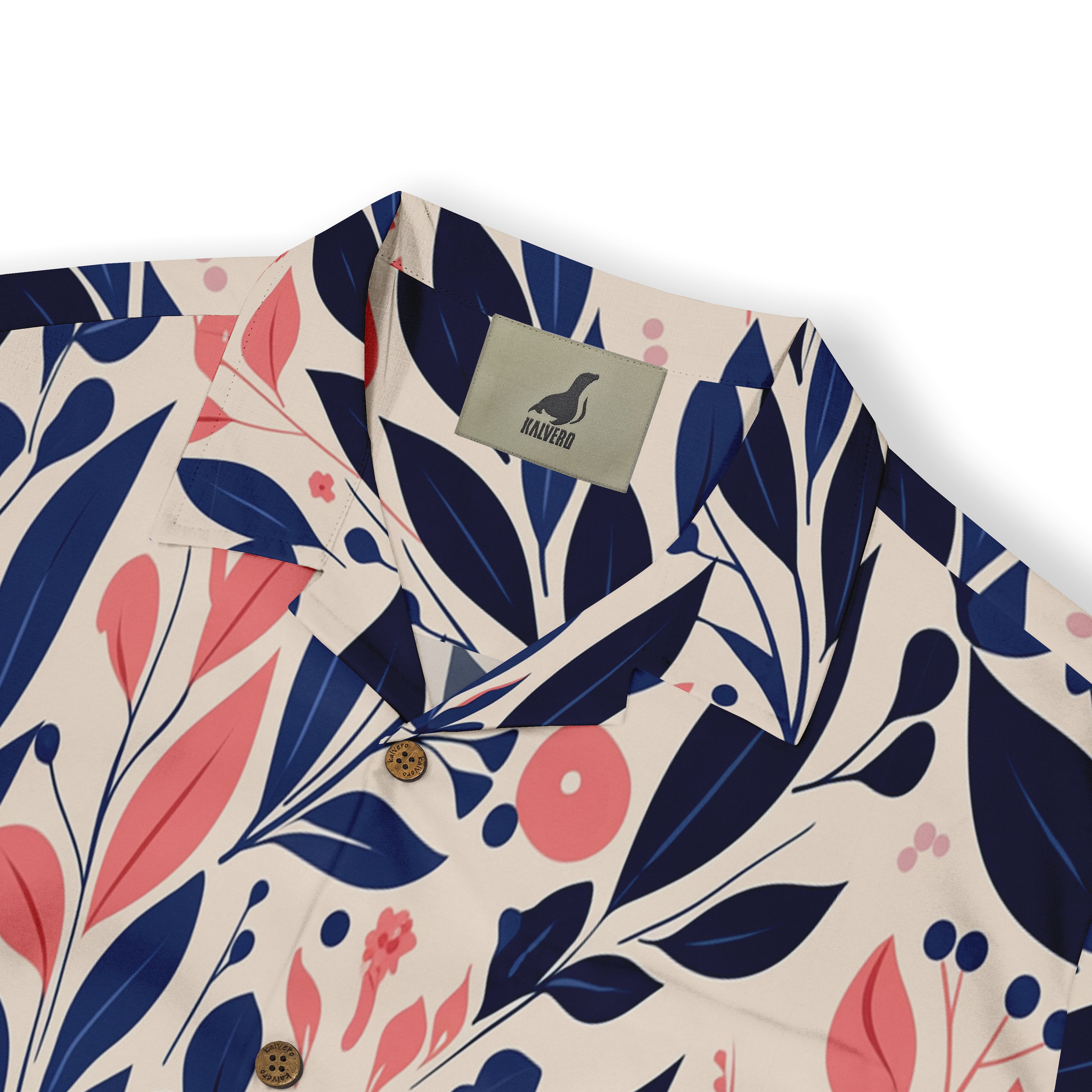 Floral-patterned shirt with navy and coral leaves, cream background.