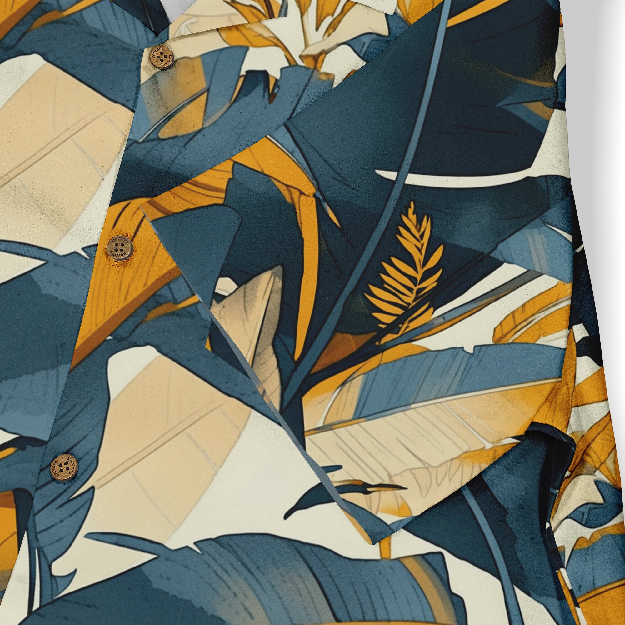 Tropical print shirt with bold blue, yellow, and cream leaves.