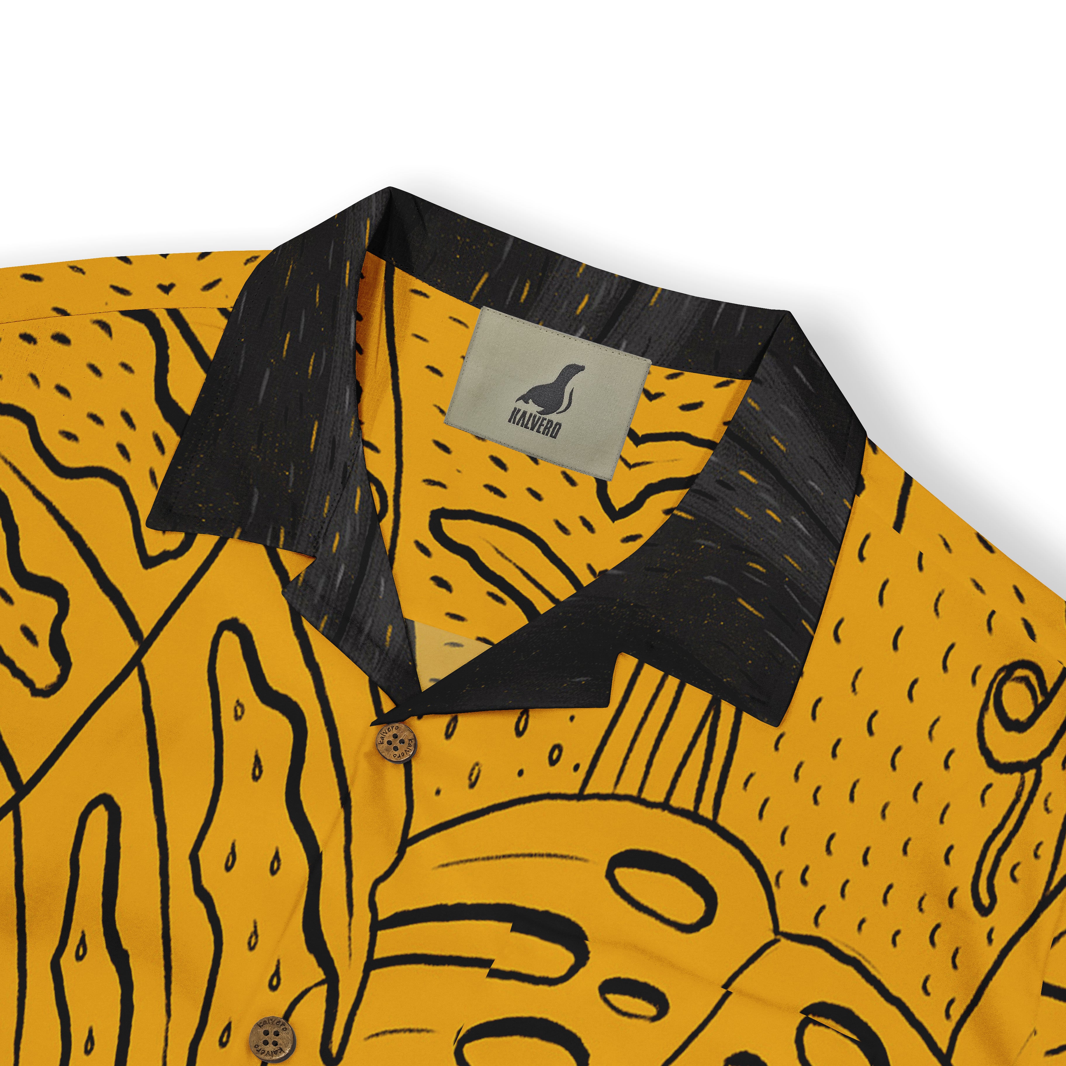 Yellow shirt with black abstract pattern, black collar, and Malvero.