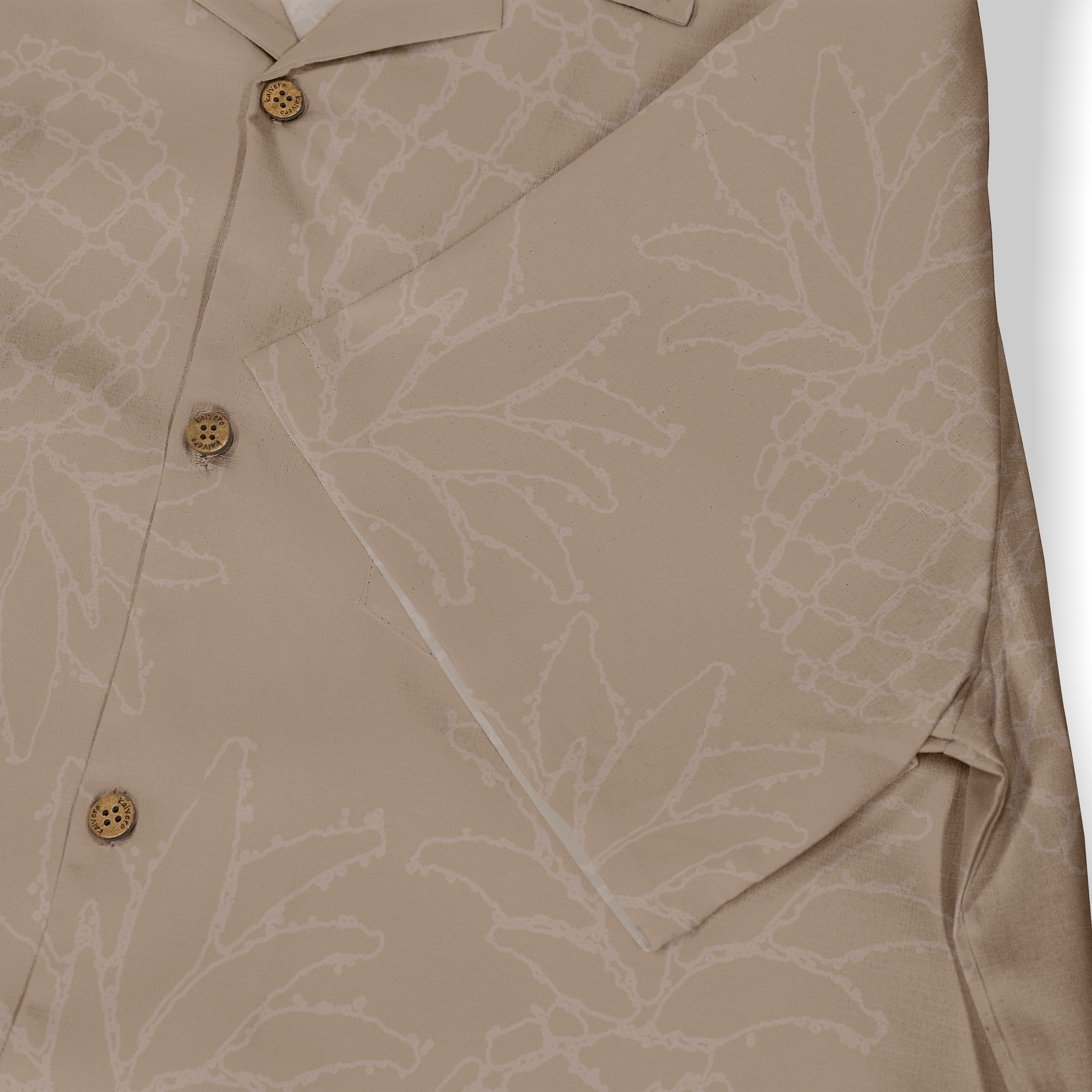 Beige shirt with pineapple pattern, wooden buttons, and a pocket.