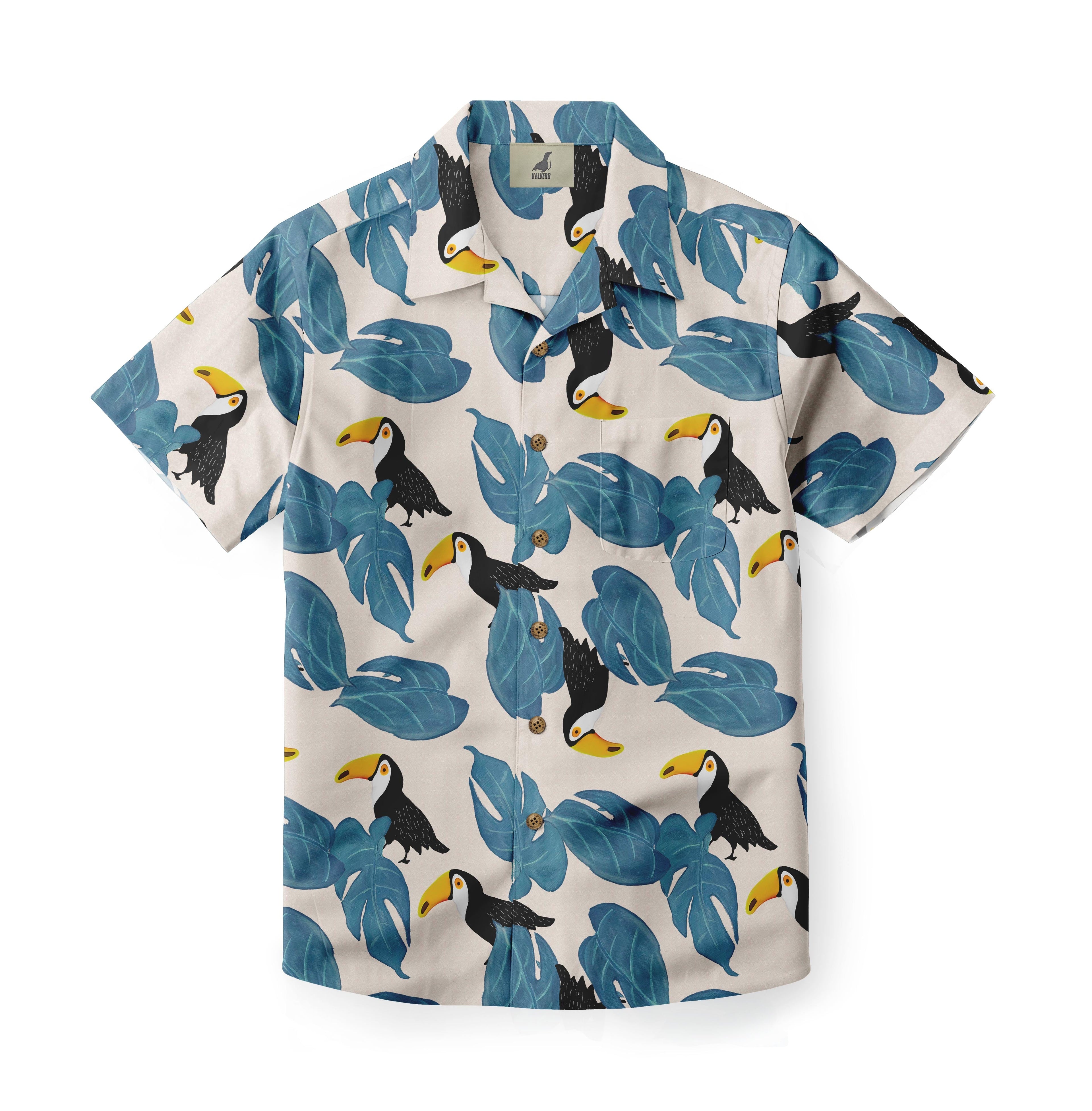 Tropical shirt with toucan and leaf print on a light background.