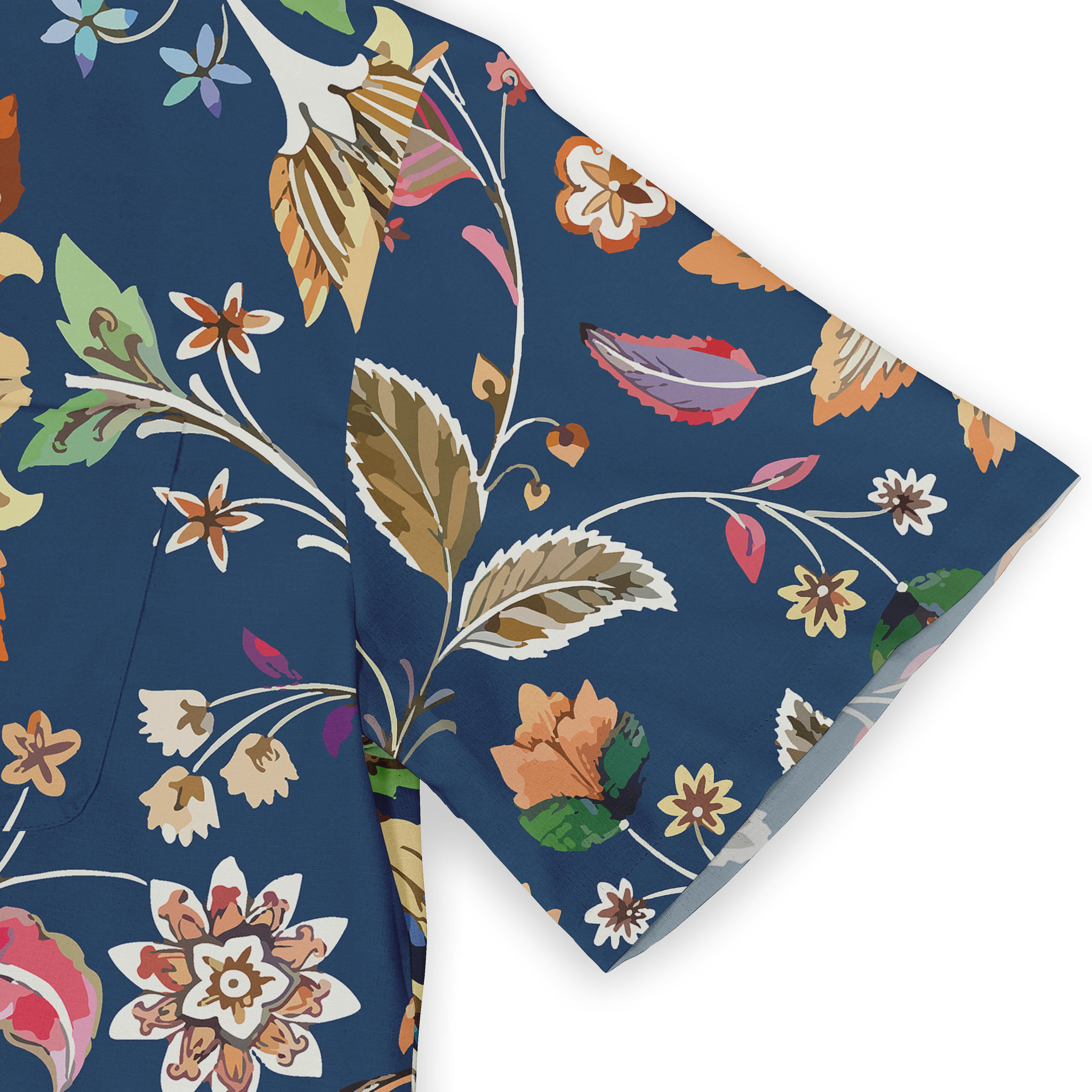 Blue fabric with colorful floral and leaf patterns.