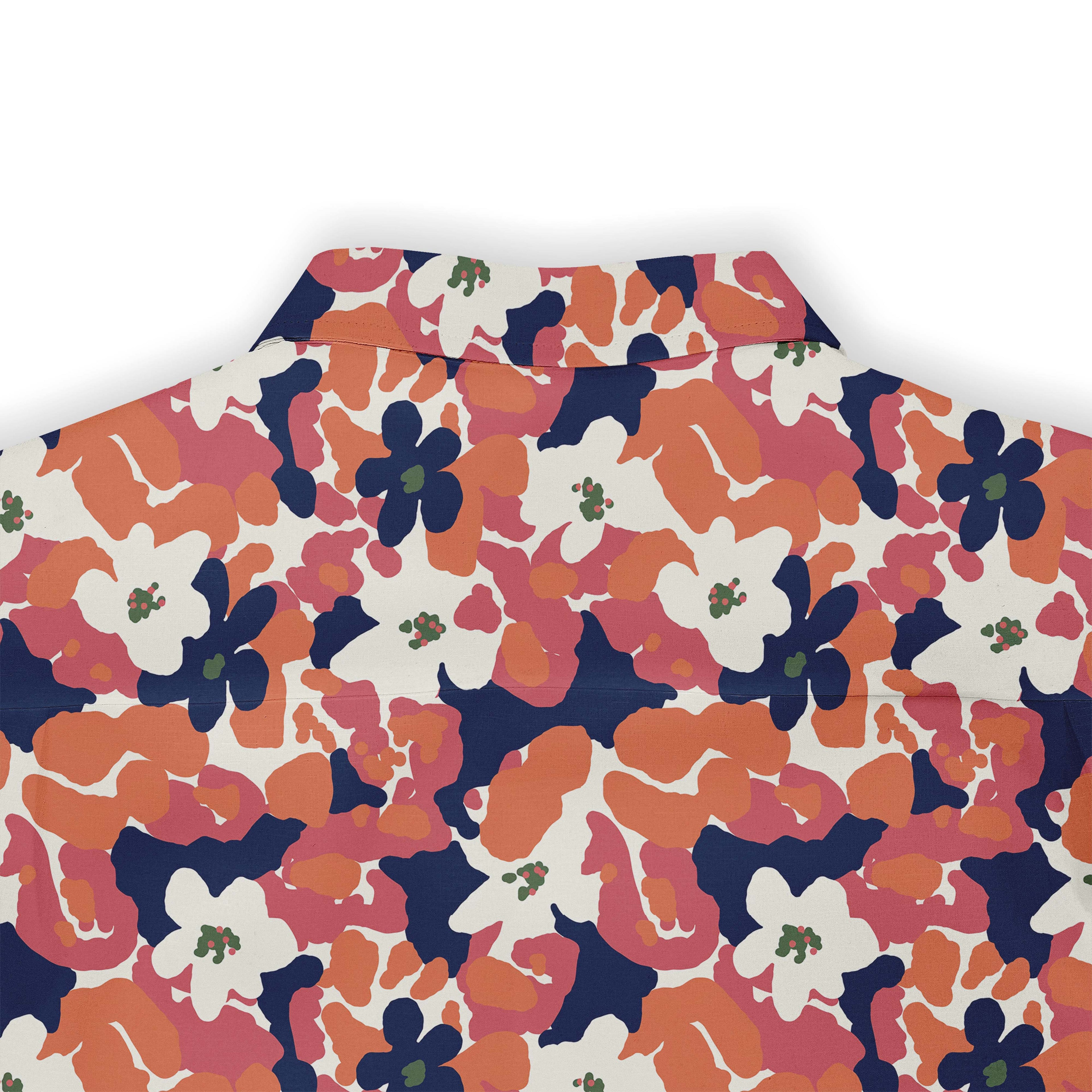 Floral shirt with orange, pink, navy pattern.