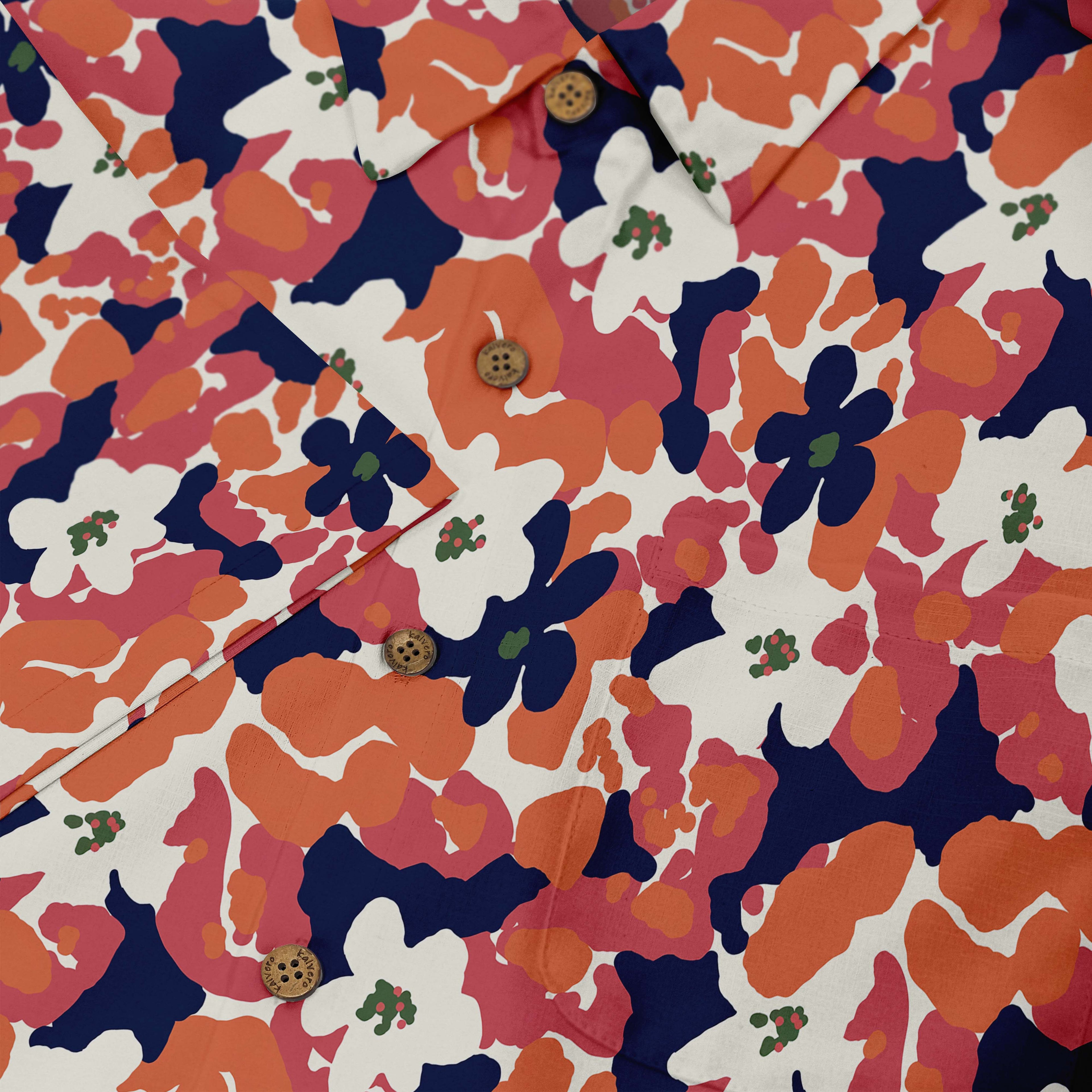 Colorful floral shirt with orange, blue, and white pattern.