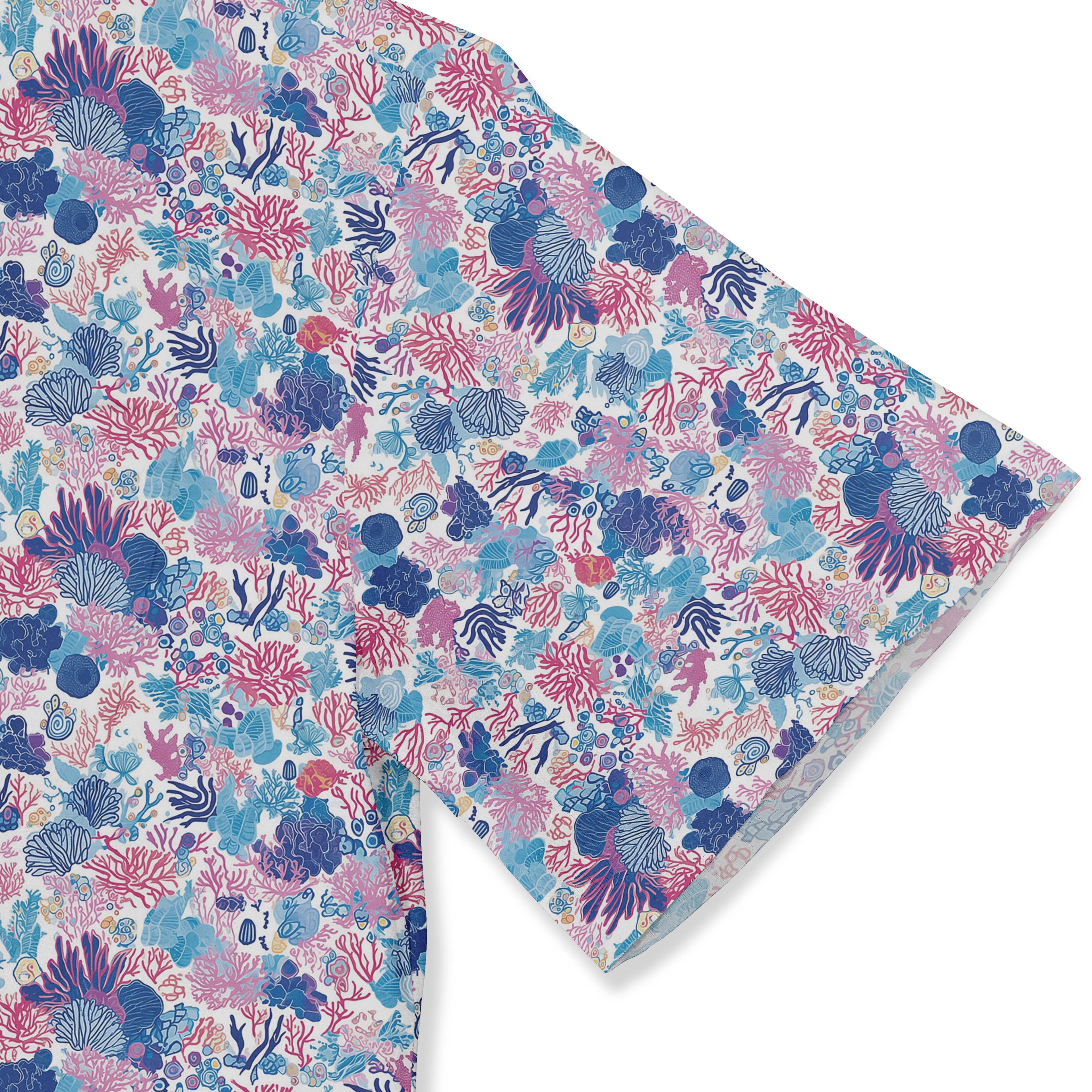 Colorful coral print fabric, vibrant blue and pink design.