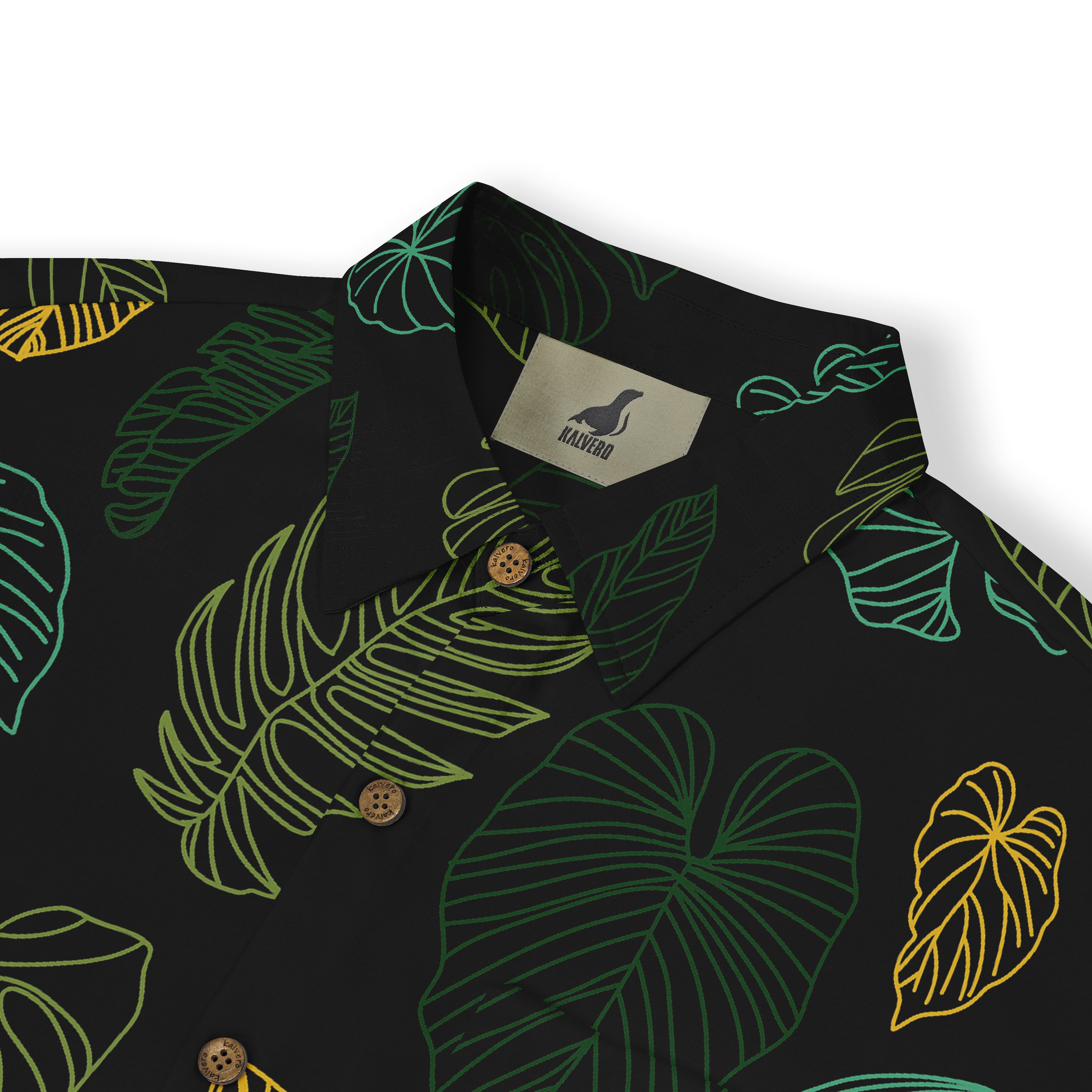 Black shirt with vibrant tropical leaf patterns in green and yellow.