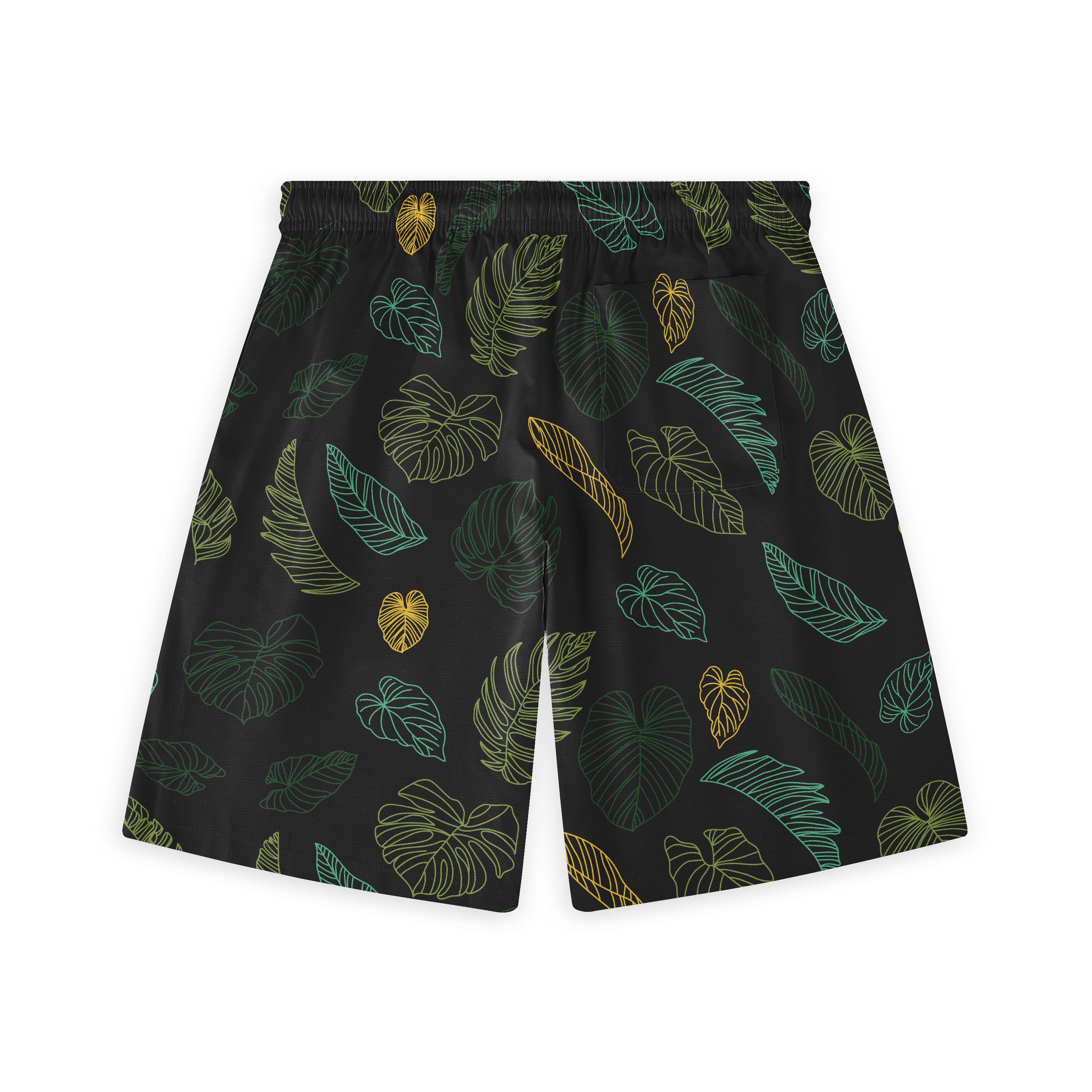 Black shorts with vibrant tropical leaf patterns in green, yellow.