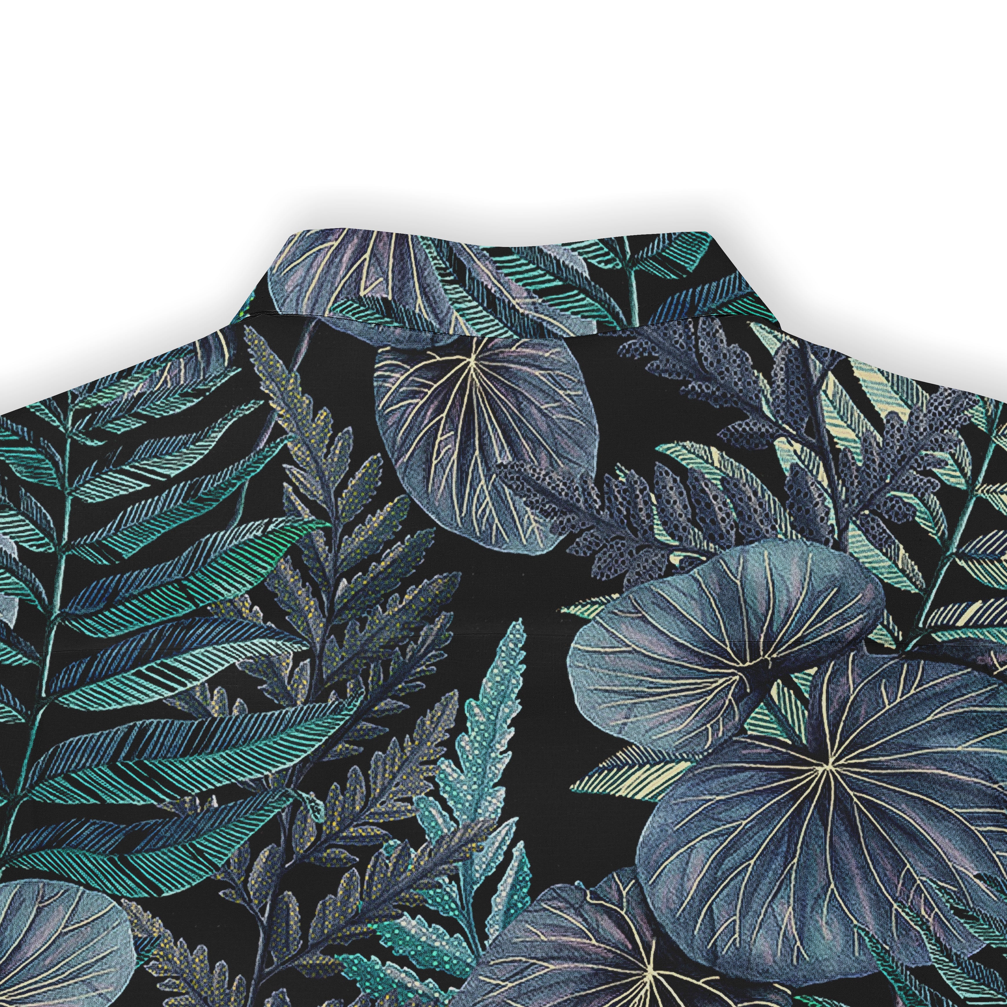 Black shirt with vibrant tropical leaf pattern in teal, blue.