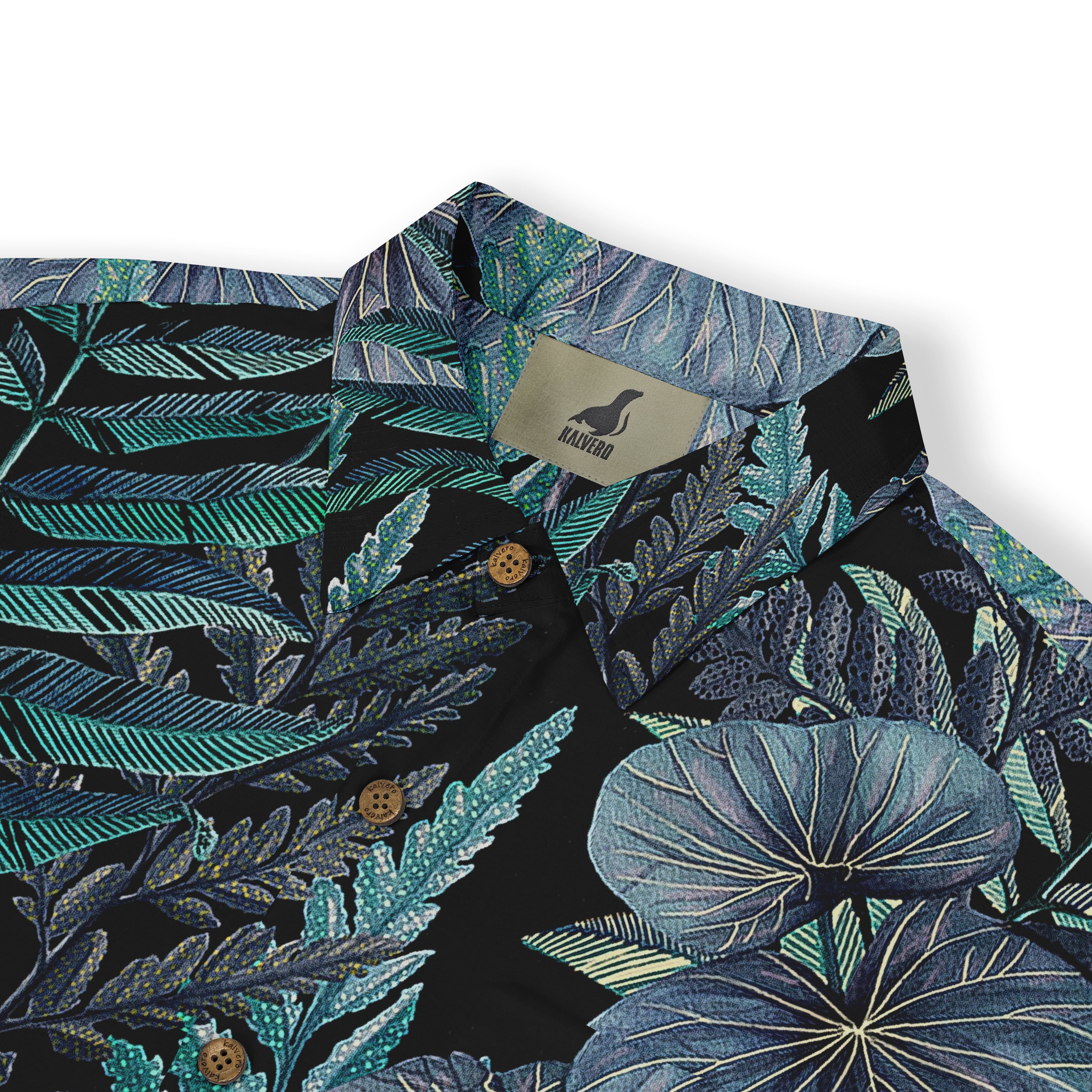 Black shirt with blue-green leaf pattern and brand tag.