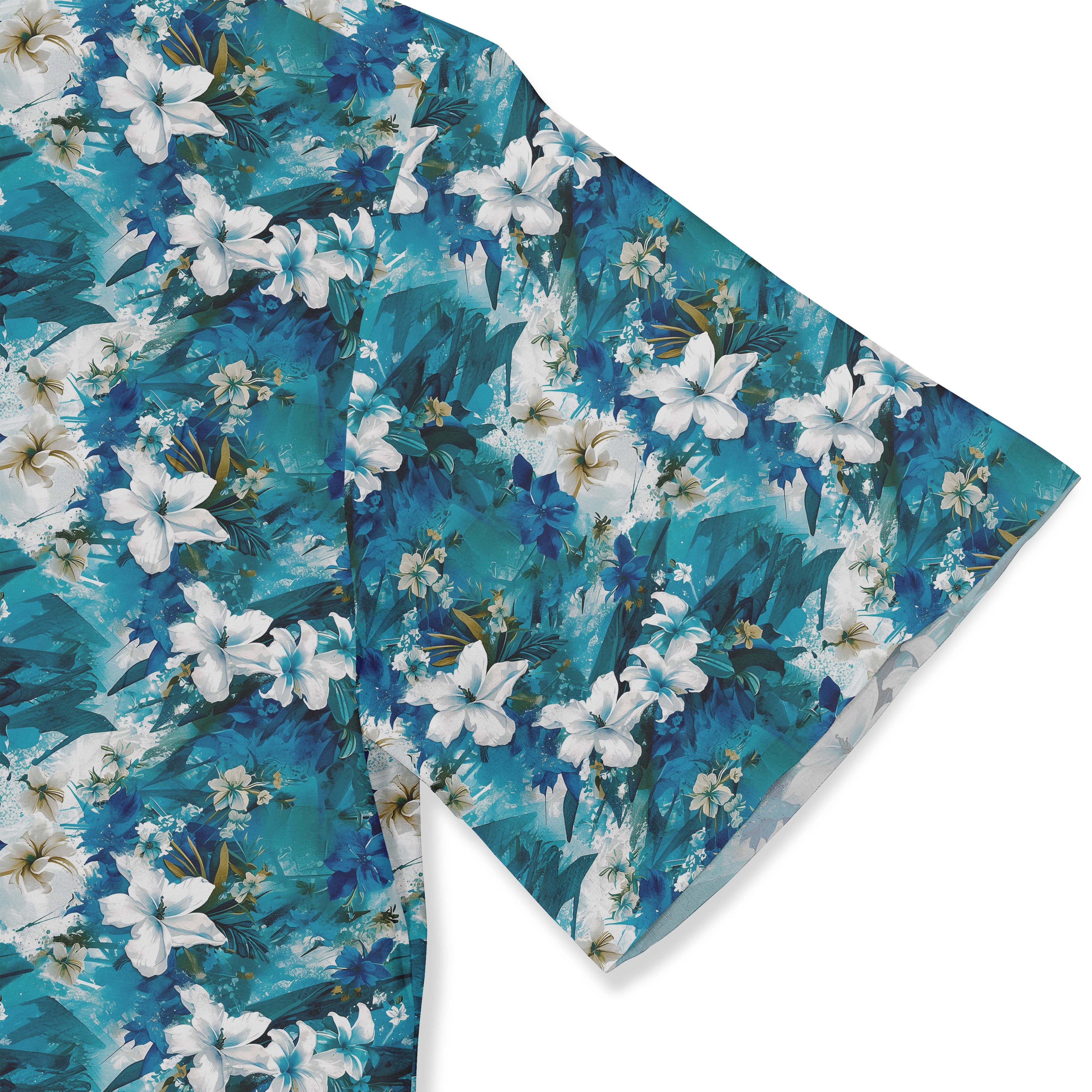 Blue floral fabric with white flowers and green leaves.