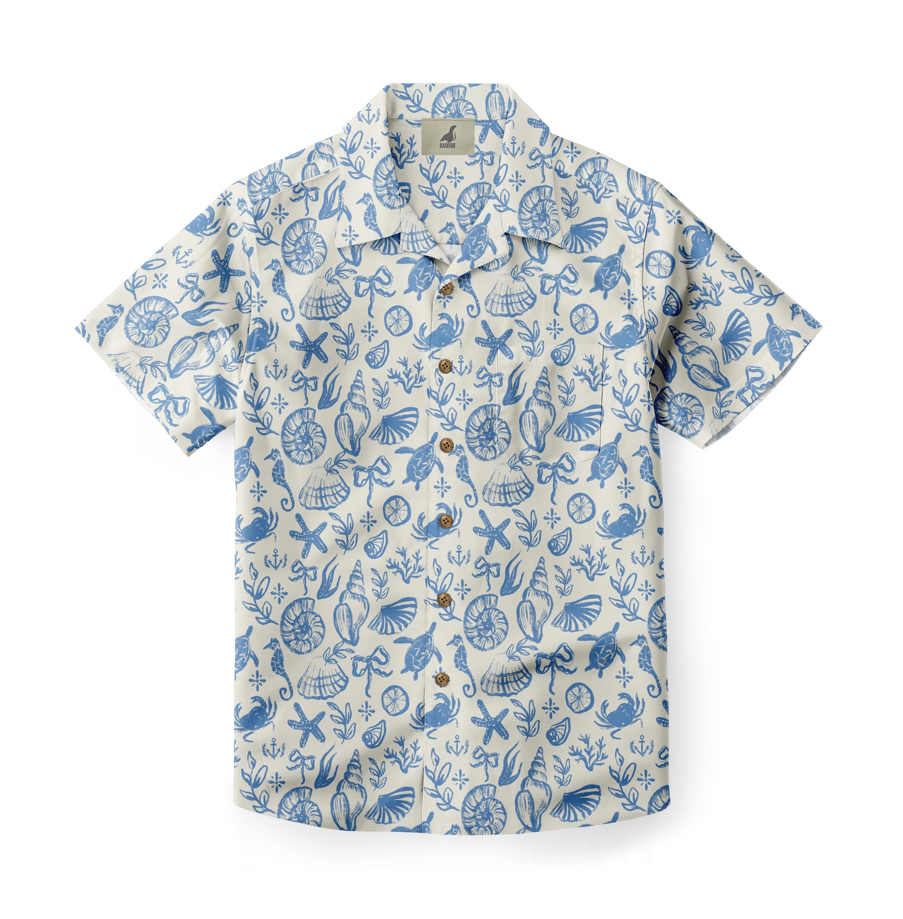 White shirt with blue sea life print, buttons down front.