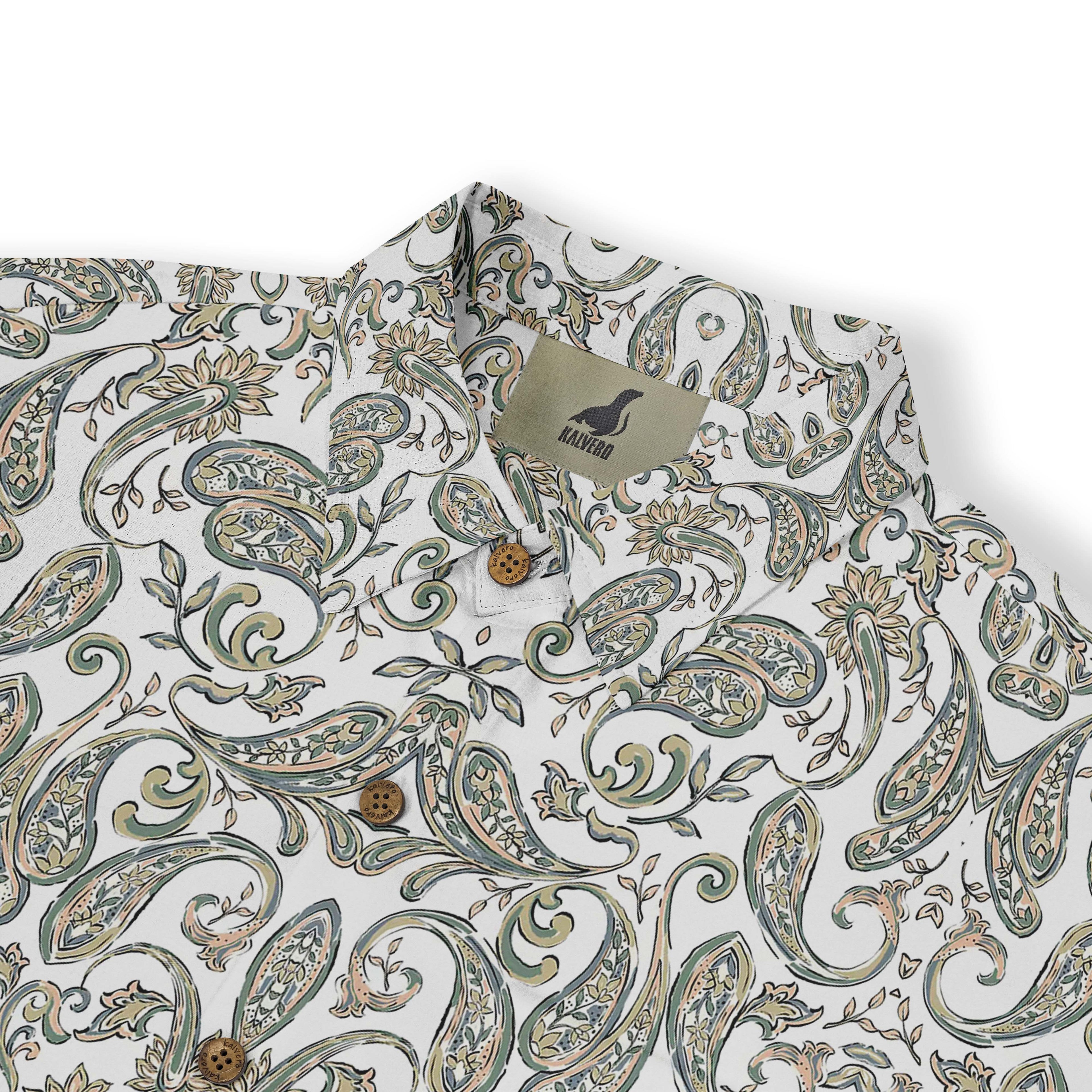 White shirt with green paisley pattern and wooden buttons.