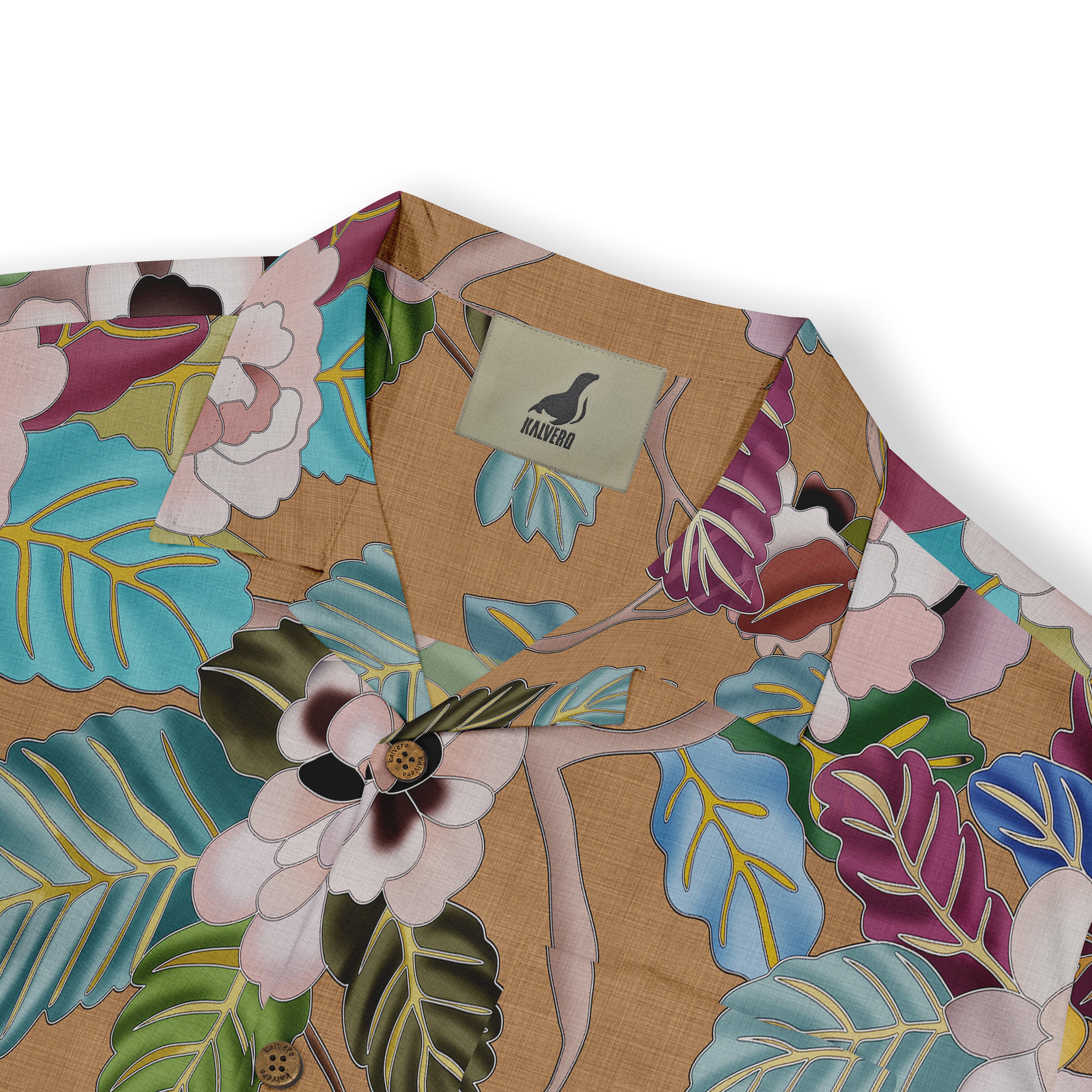 Brown shirt with colorful floral pattern and logo tag.