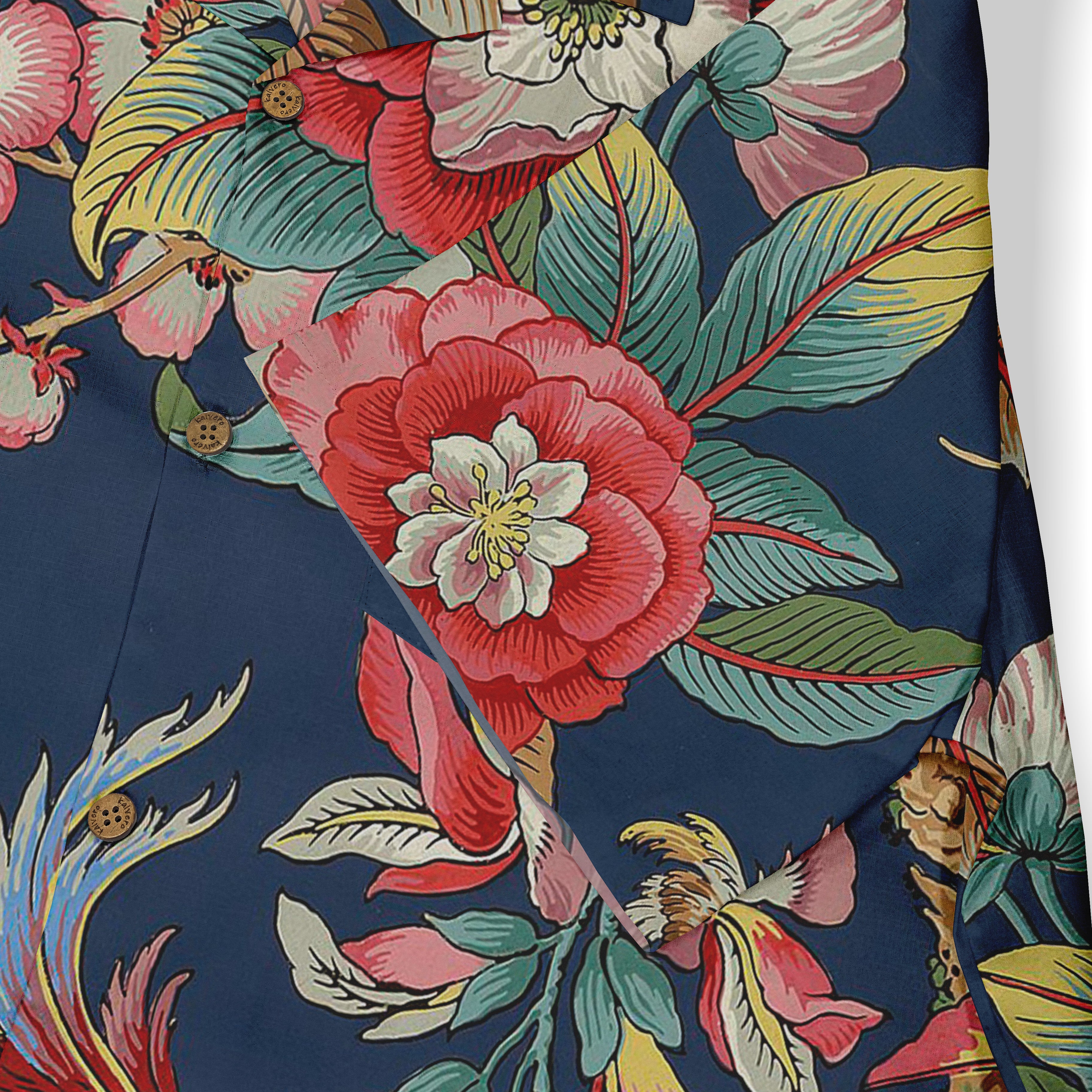 Vibrant floral pattern on navy fabric with bold red, pink, and green.