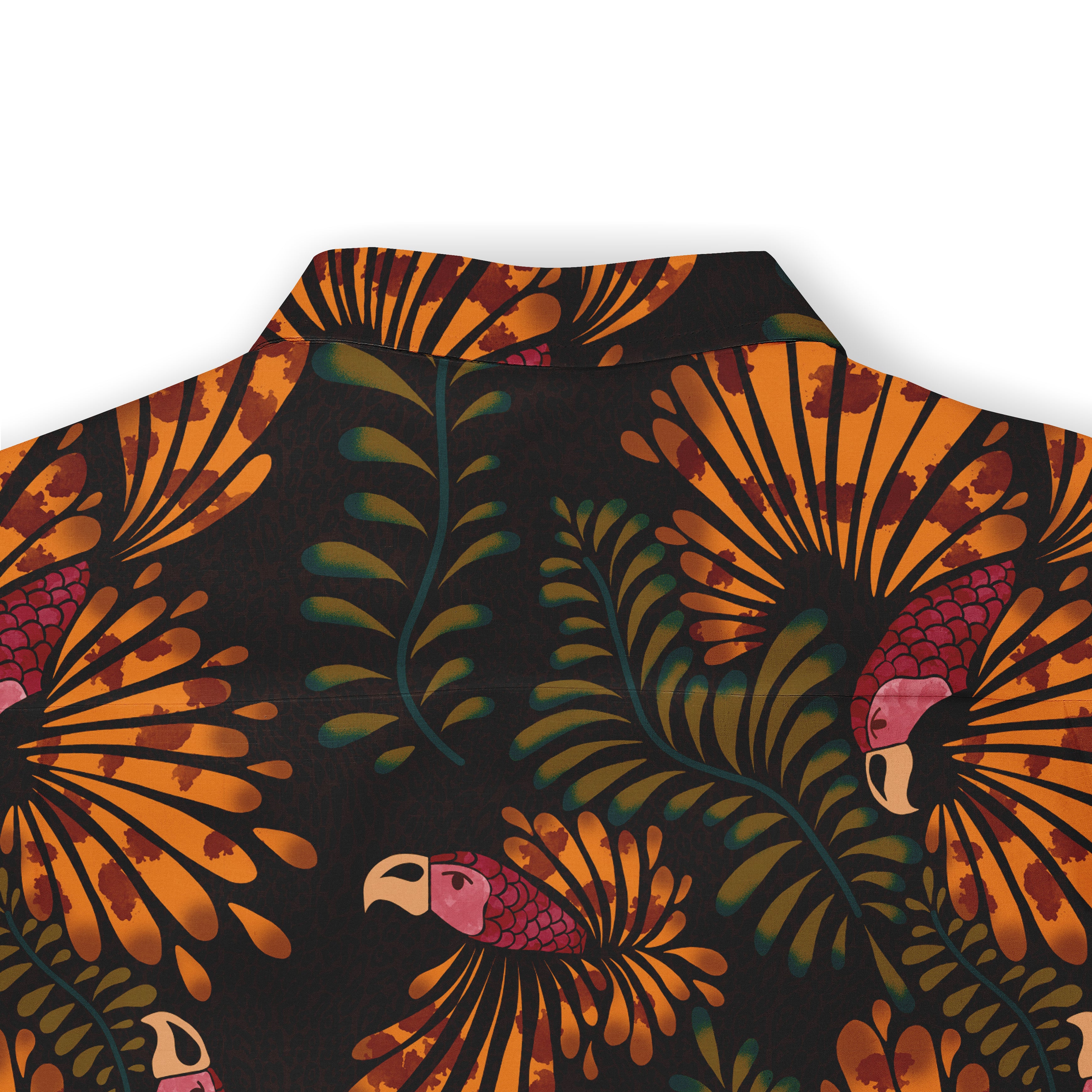 Tropical shirt with vibrant toucan and leaf pattern on dark.