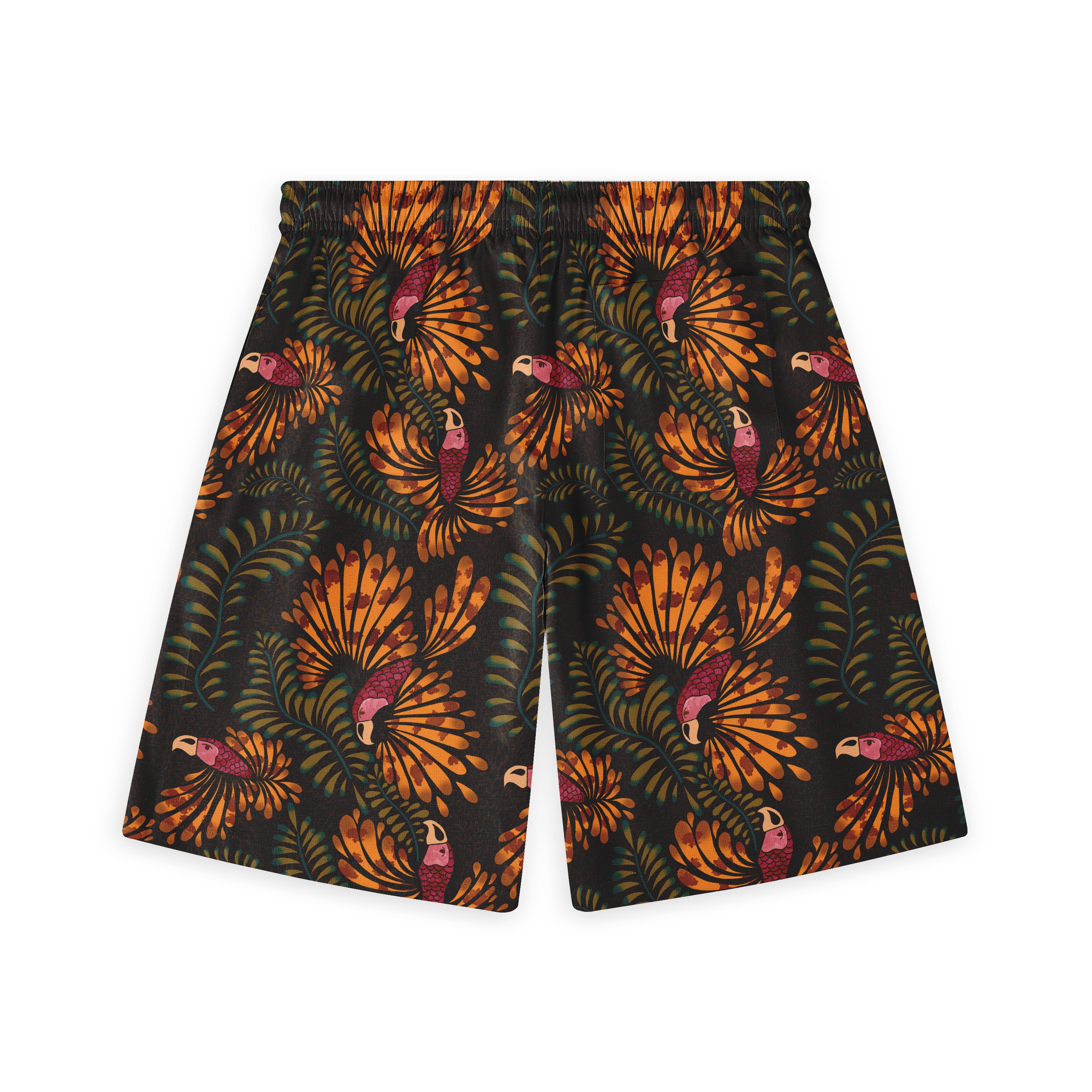 Black shorts with vibrant orange and pink toucan print on a tropical.