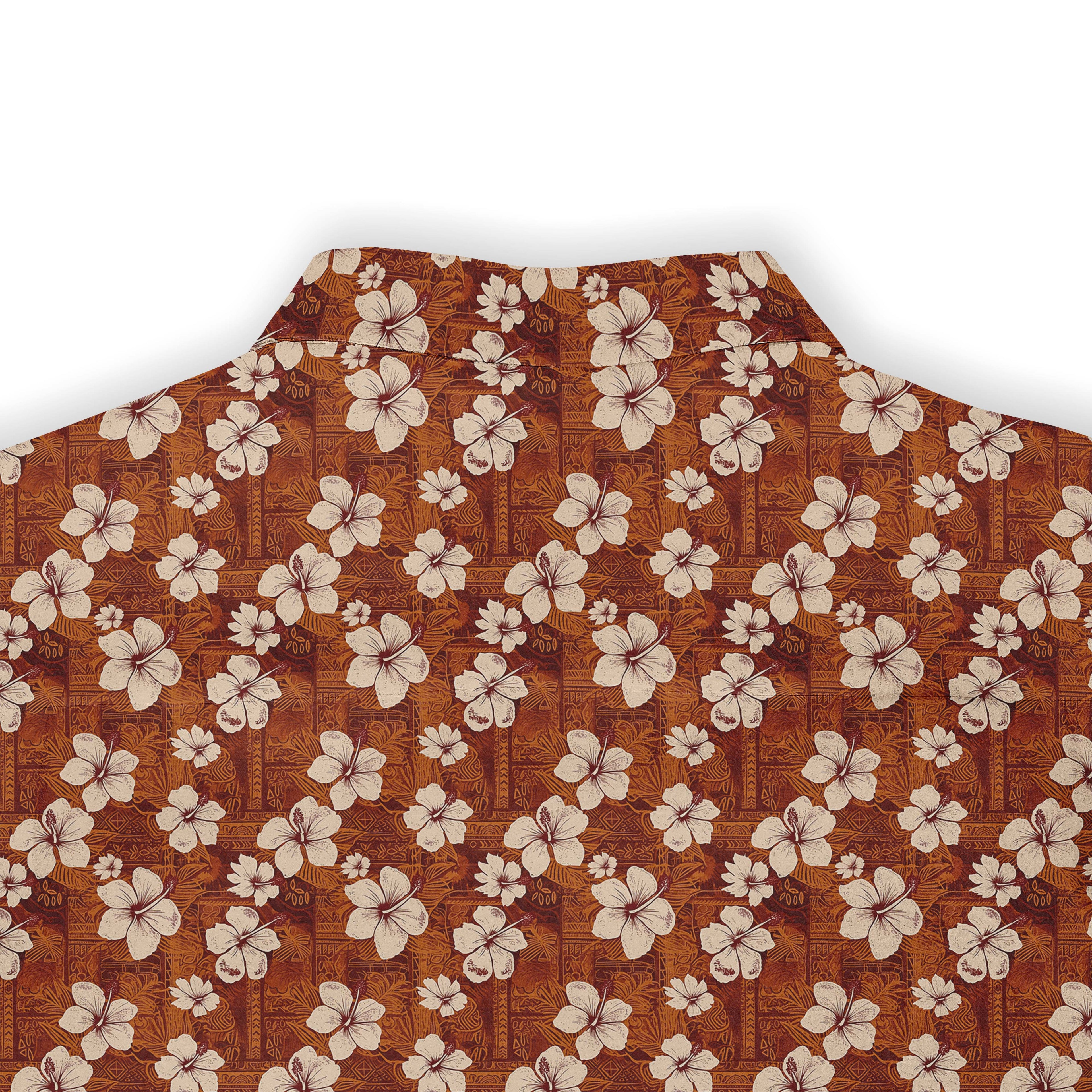 Brown shirt with white hibiscus flowers and geometric patterns.