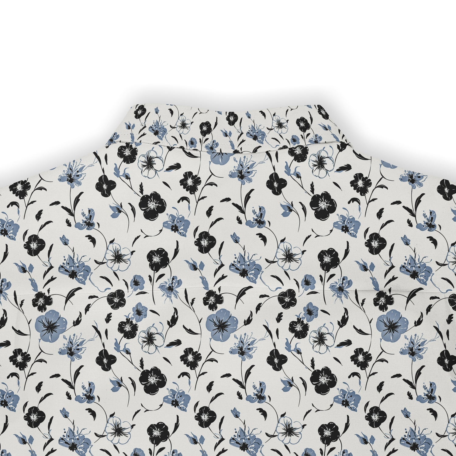 White fabric with black and blue floral pattern.