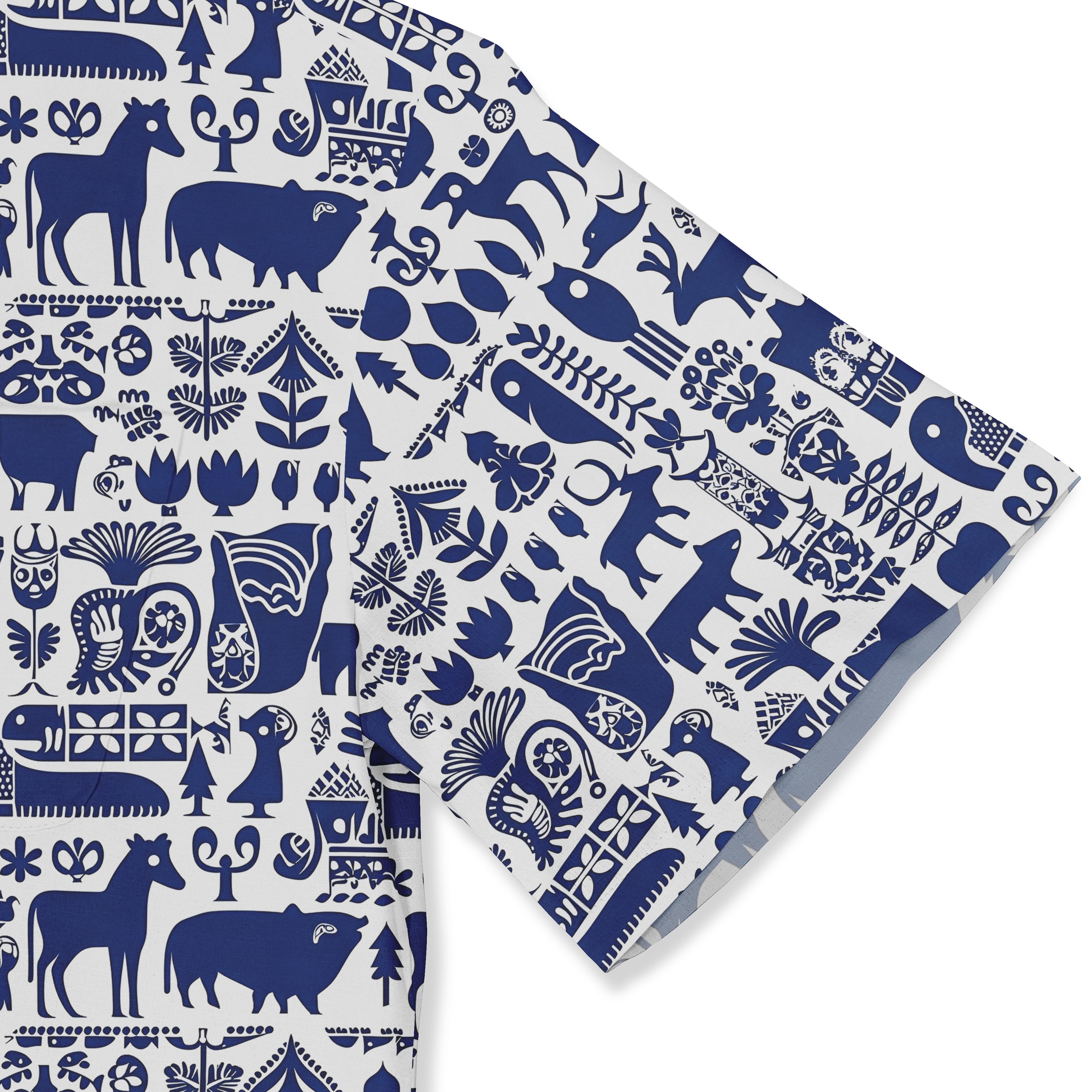 Blue and white patterned fabric with animals, plants, and geometric.