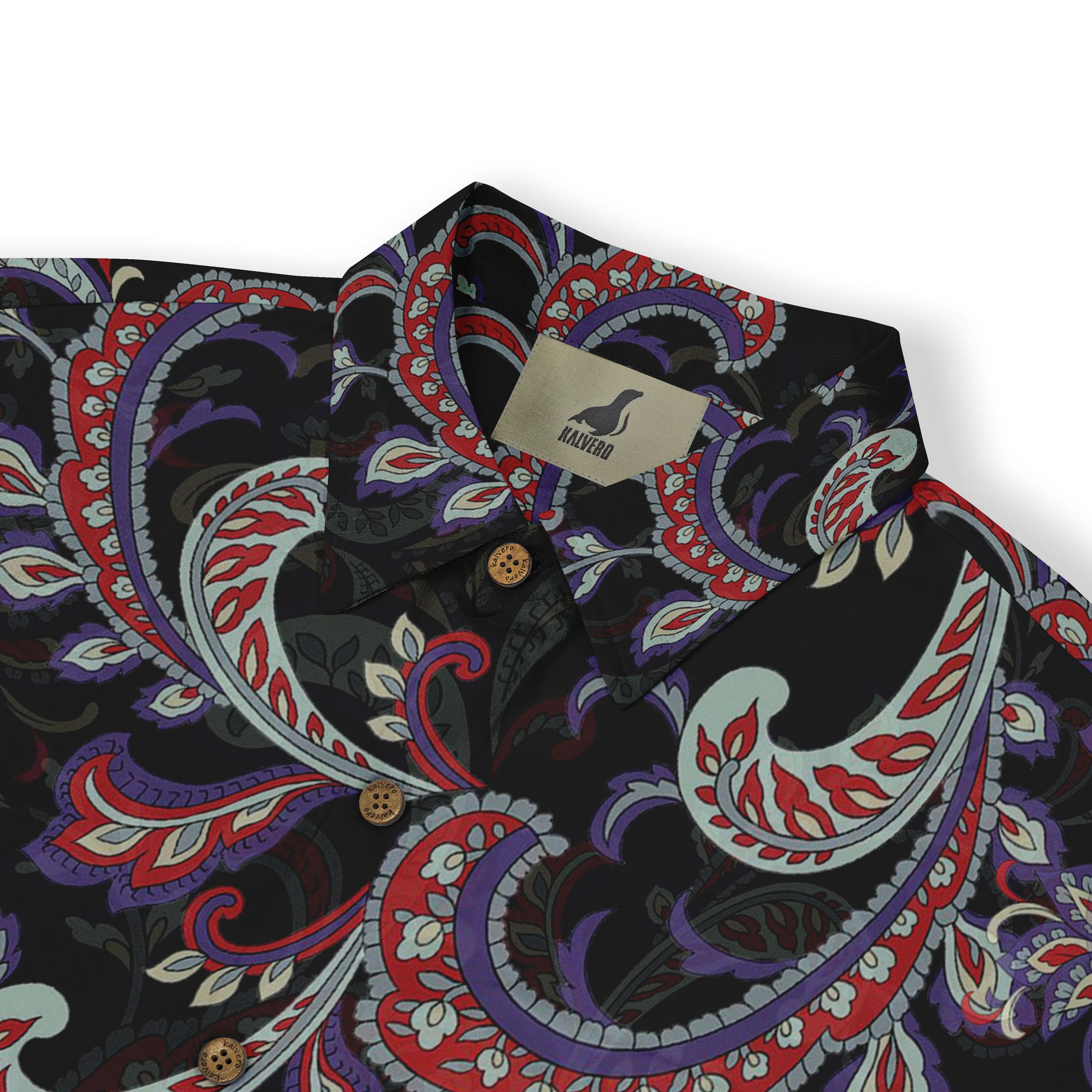 Black shirt with vibrant paisley pattern in red, purple, and white.