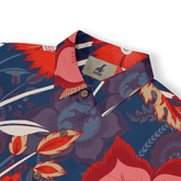 Vibrant floral shirt with bold red, blue, and purple patterns.