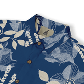 Blue floral shirt with white patterns, wooden buttons, and Kalvero.