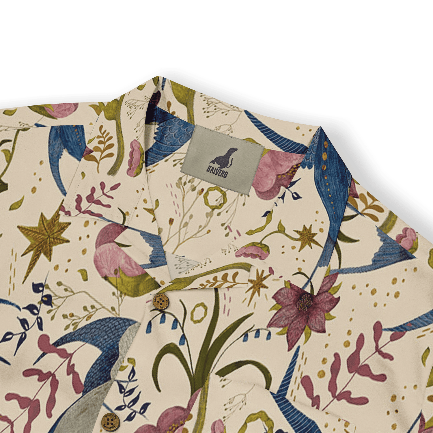 Floral-patterned shirt with birds, flowers, and stars on a cream.