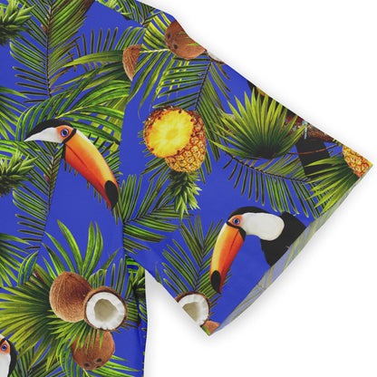 Tropical print fabric with toucans, pineapples, coconuts, and palm.